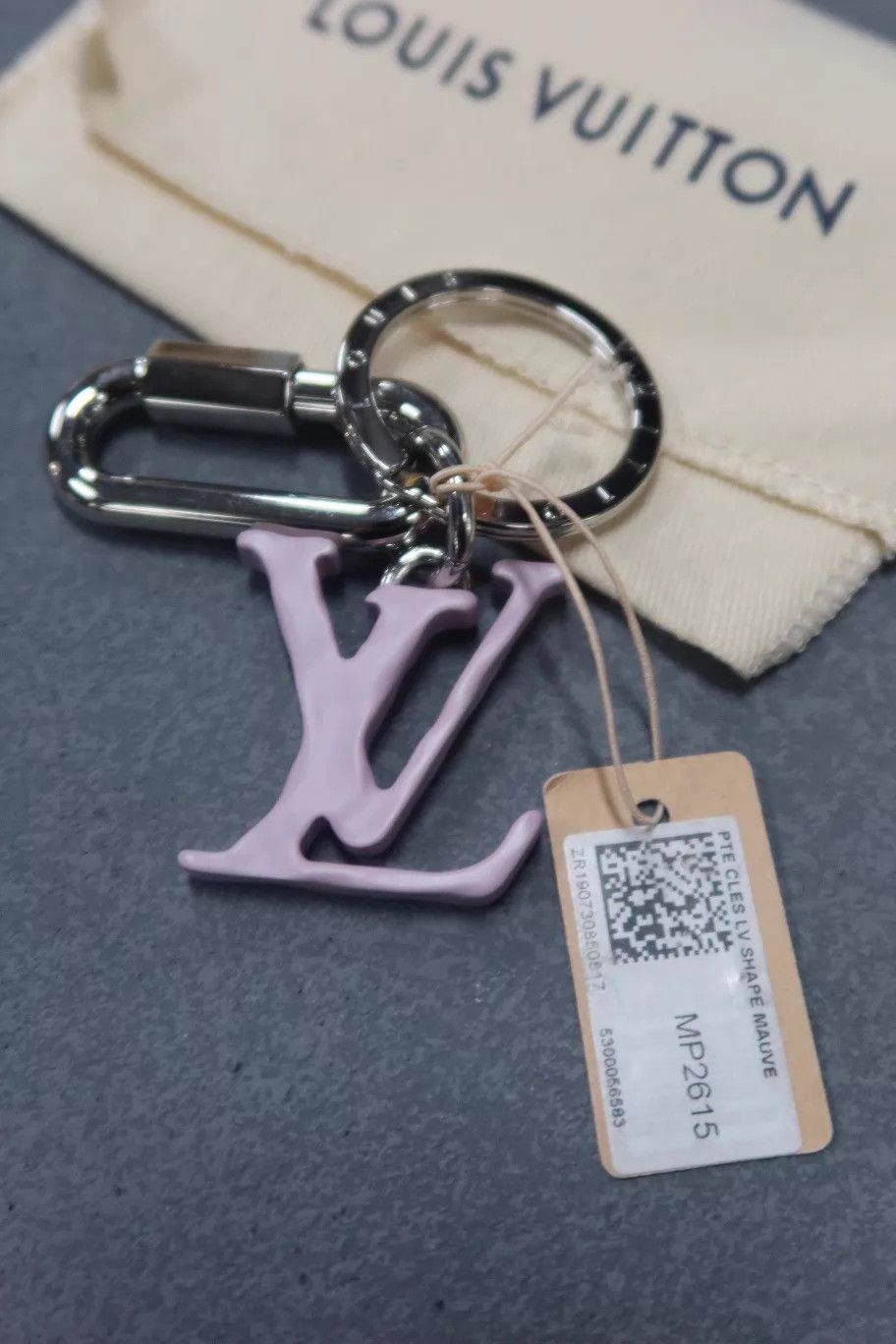 Louis Vuitton LV Shape Pink Big Logo Keychain NWT Size ONE SIZE - 1 Thumbnail