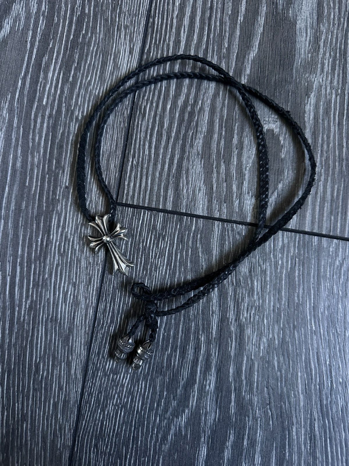 chrome hearts cross pendant with leather braided necklace