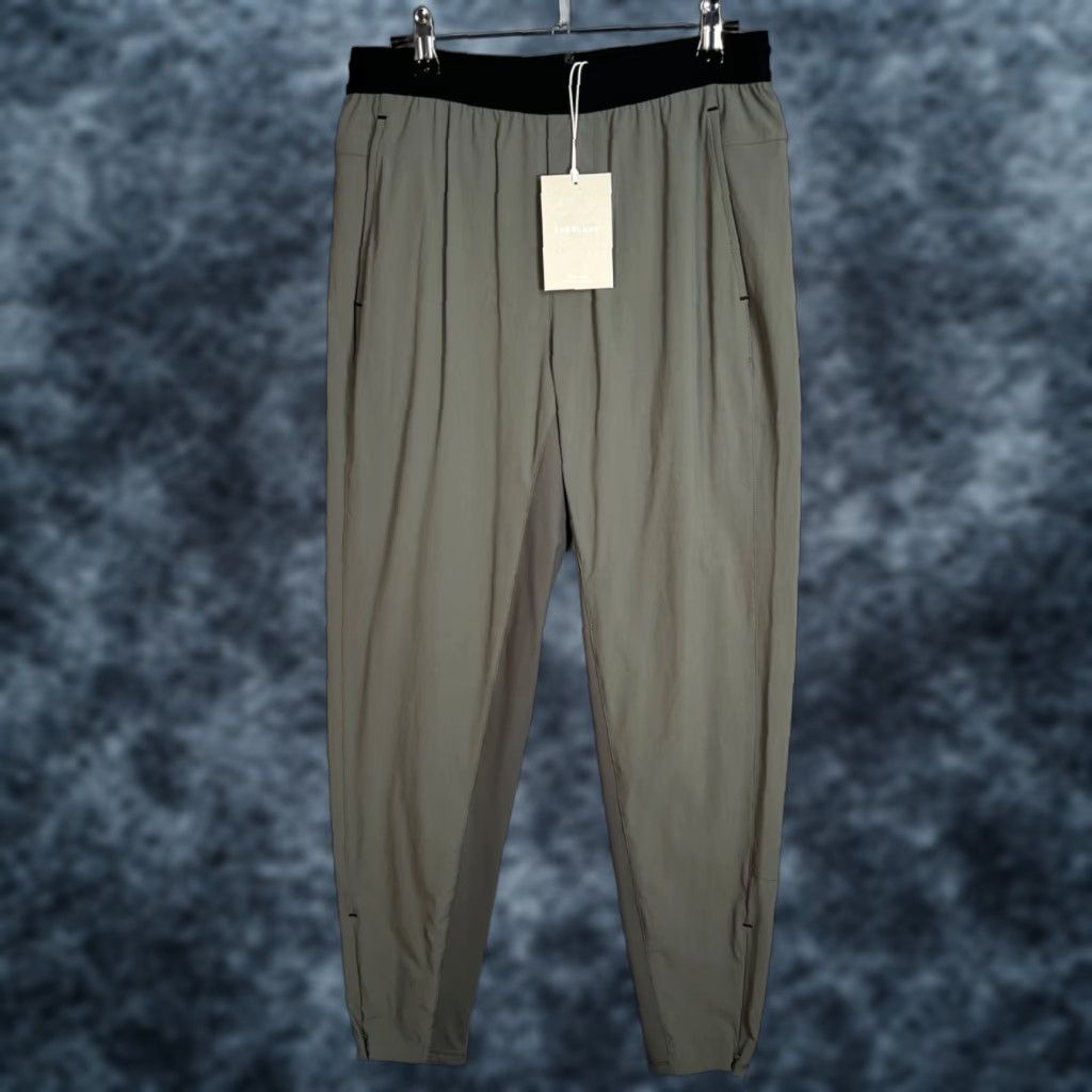 Everlane Everlane Womens E3 Jogger Pants 29 x 28 Olive Green Nylon Recycled Front Flat Front High Rise Tapered Regular Size 29" - 1 Thumbnail