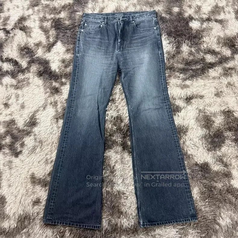 Balenciaga SS24 Washed Flared Denim Pants.