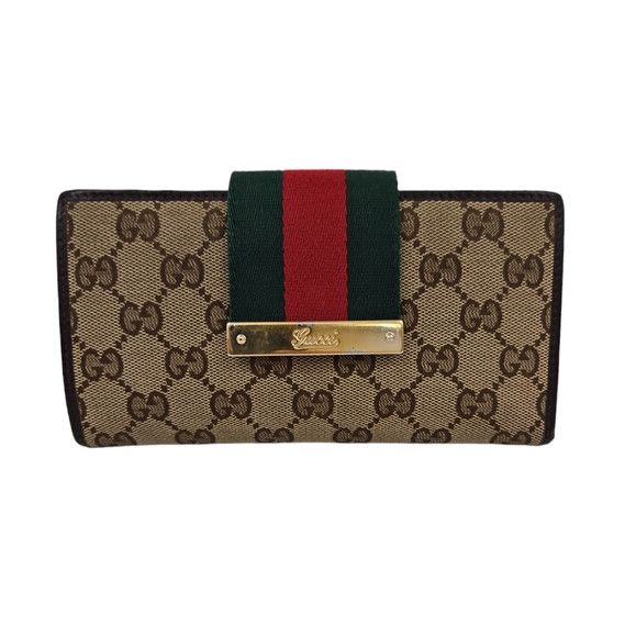 image of Gucci GG Canvas And Leather Web Flap Continental Wallet in Brown, Women's