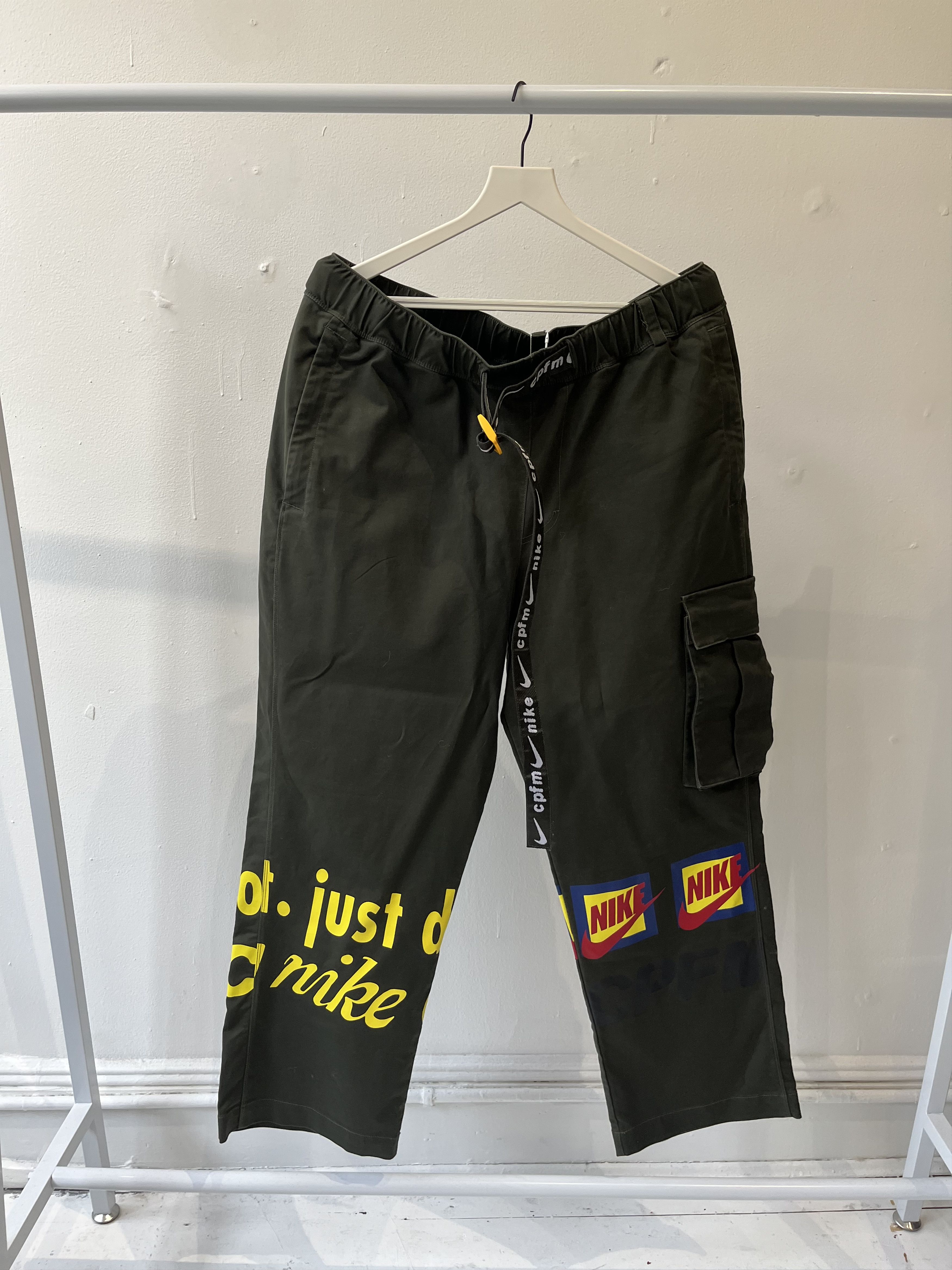image of Cactus Plant Flea Market x Nike Cargo Trackpants in Olive Green, Men's (Size 34)