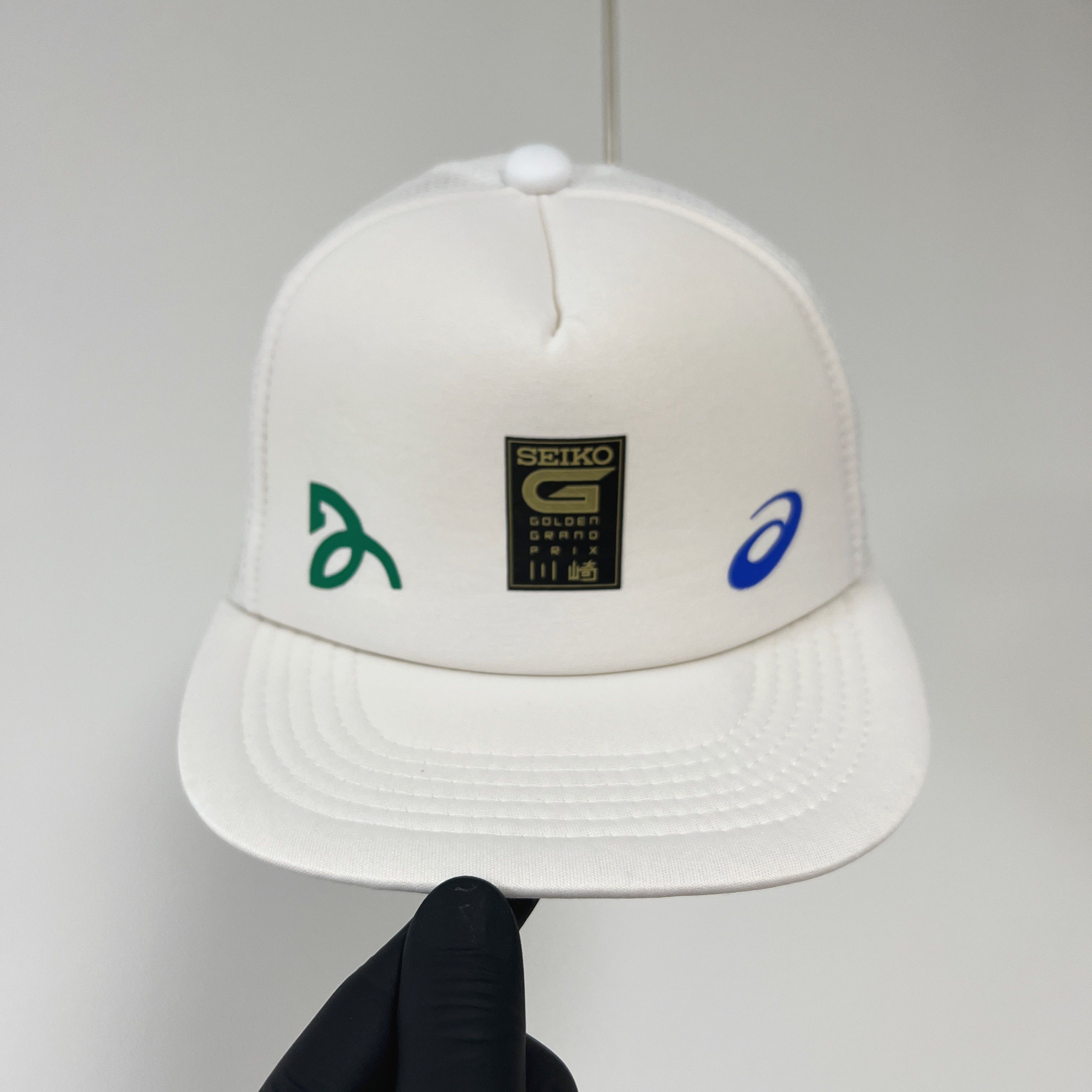 Asics Novak Seiko Golden Grand Prix Trucker Cap