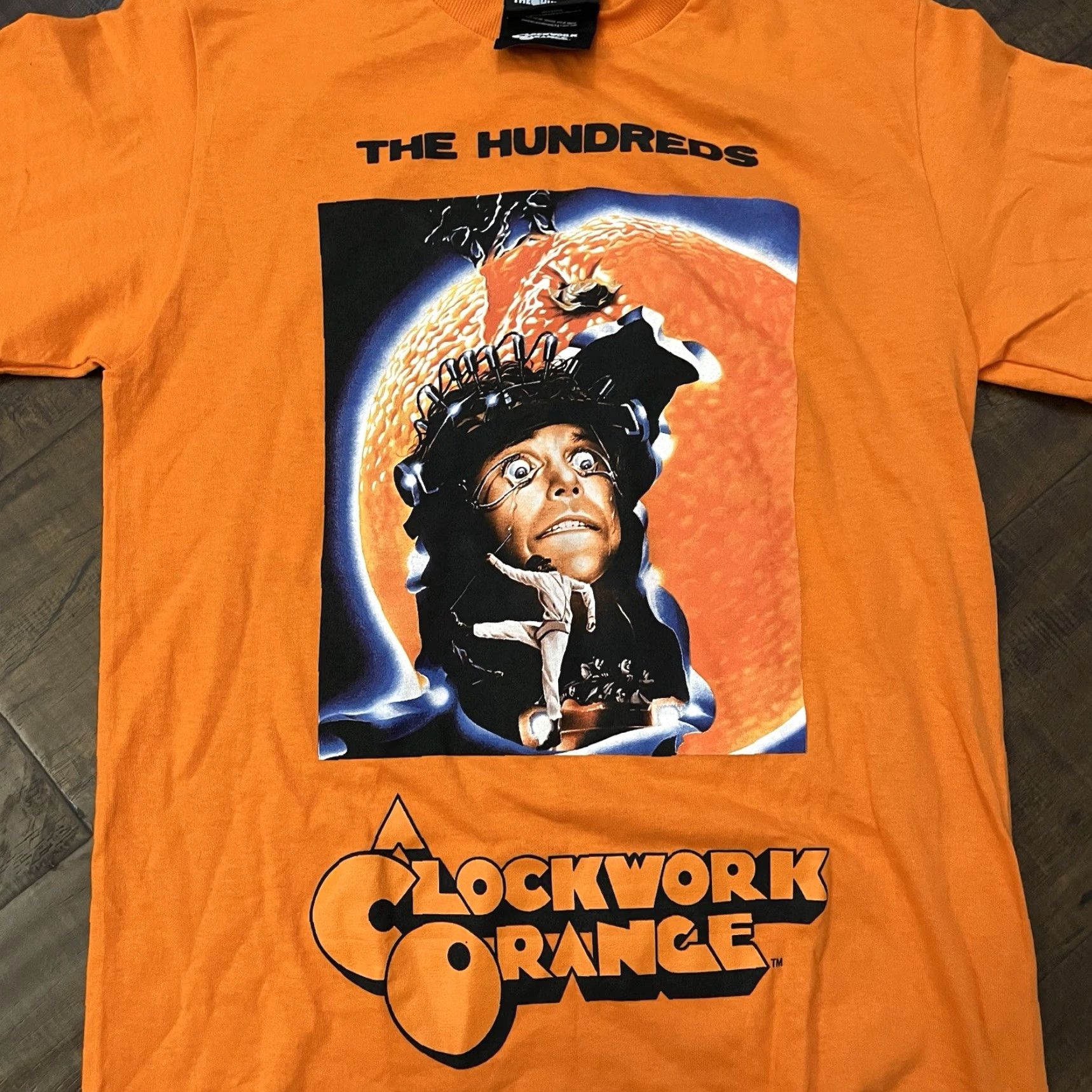 The Hundreds The Hundreds A Clockwork Orange T-Shirt Mens S Orange Graphic Print Crew Neck 70s Classic Funny RARE Size US S / EU 44-46 / 1 - 2 Thumbnail