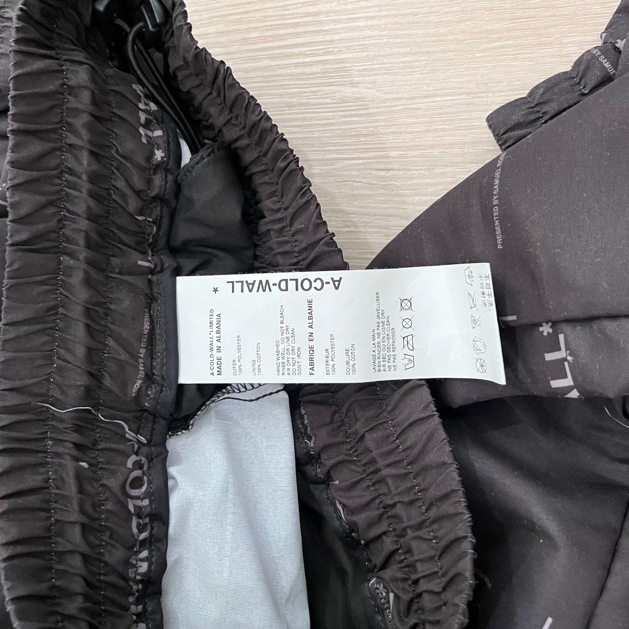 A-COLD-WALL* A-Cold-Wall* Black All-Over Logo Prints Nylon Jogger Pants Size US 30 / EU 46 - 5 Thumbnail