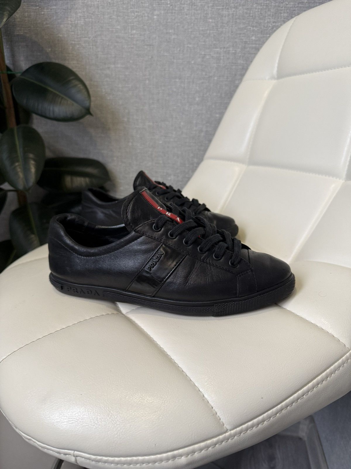 Prada Prada Black Leather Low-Top Sneakers with Red Stripe Logo Size US 7 / IT 37 - 9 Thumbnail