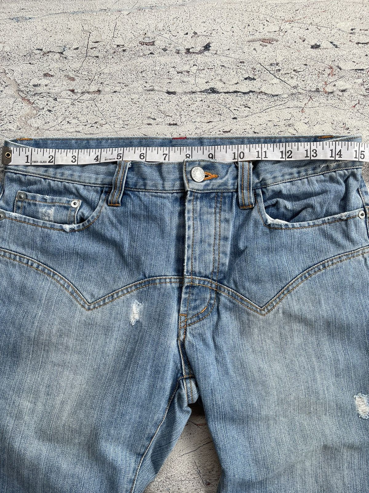 Sunao kuwahara distressed jeans by issey miyake