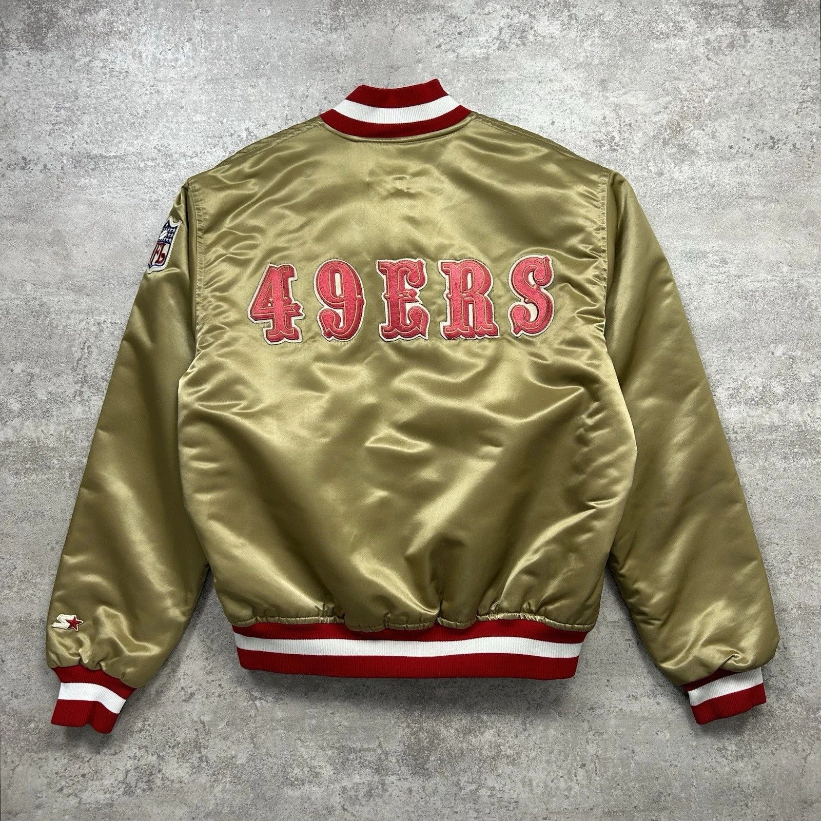 SAN FRANCISCO 49ERS STARTER SATIN BOMBER JACKET SPELL OUT