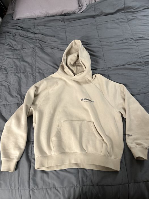 Fear of god essentials hoodie online tan