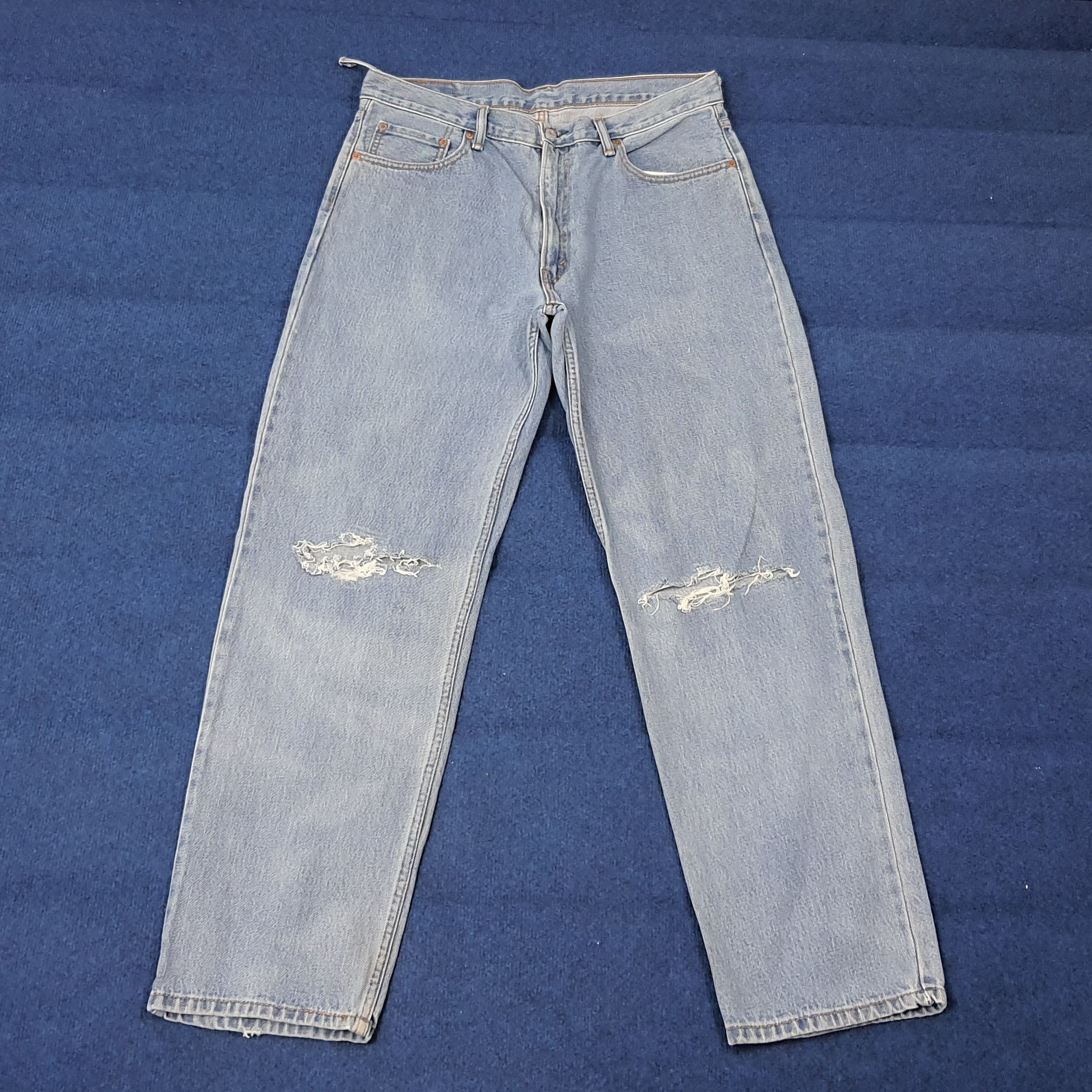 VINTAGE 90s LEVI'S 550 Distressed Light Wash Jeans C272N7