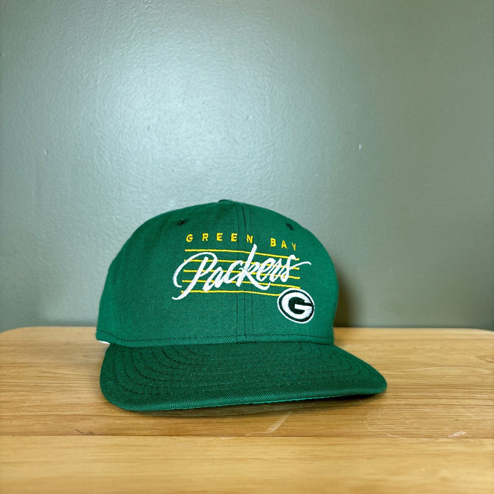 Vintage 1990s Green good Bay Packers NFL Football All Over Script Snapback Hat