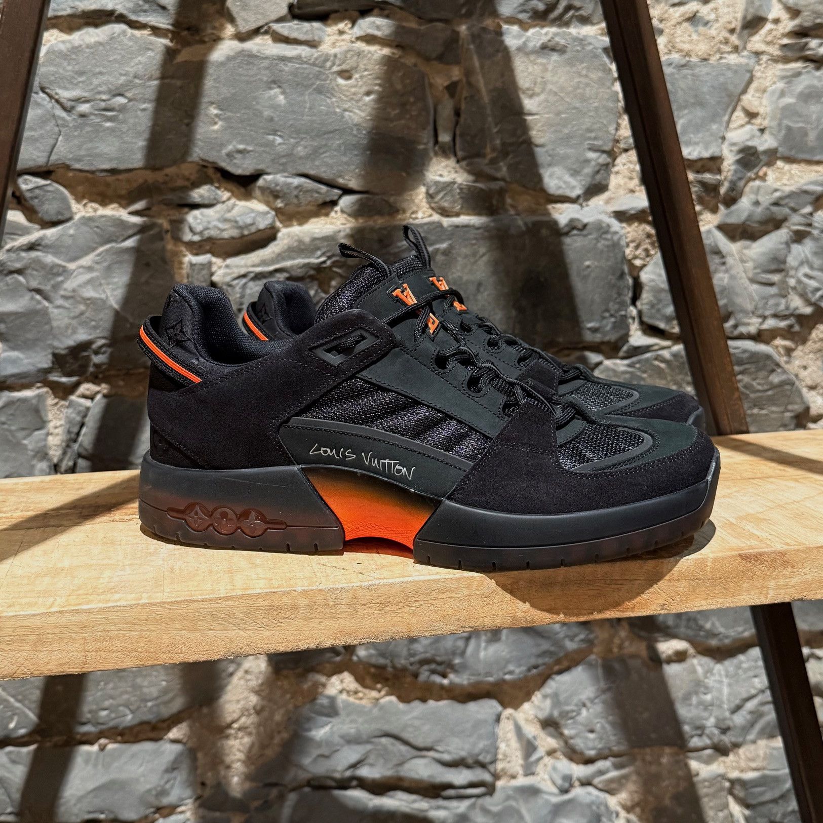 Louis Vuitton Black and Orange Athletic Shoes A dash of luxury wearing one of these LV trainers will  main image 2