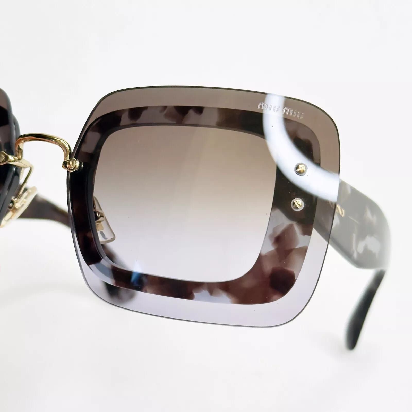Miu Miu MIU MIU REVEAL MU02RS Lilac Brown Fashion Sunglasses 02R Size ONE SIZE - 10 Thumbnail