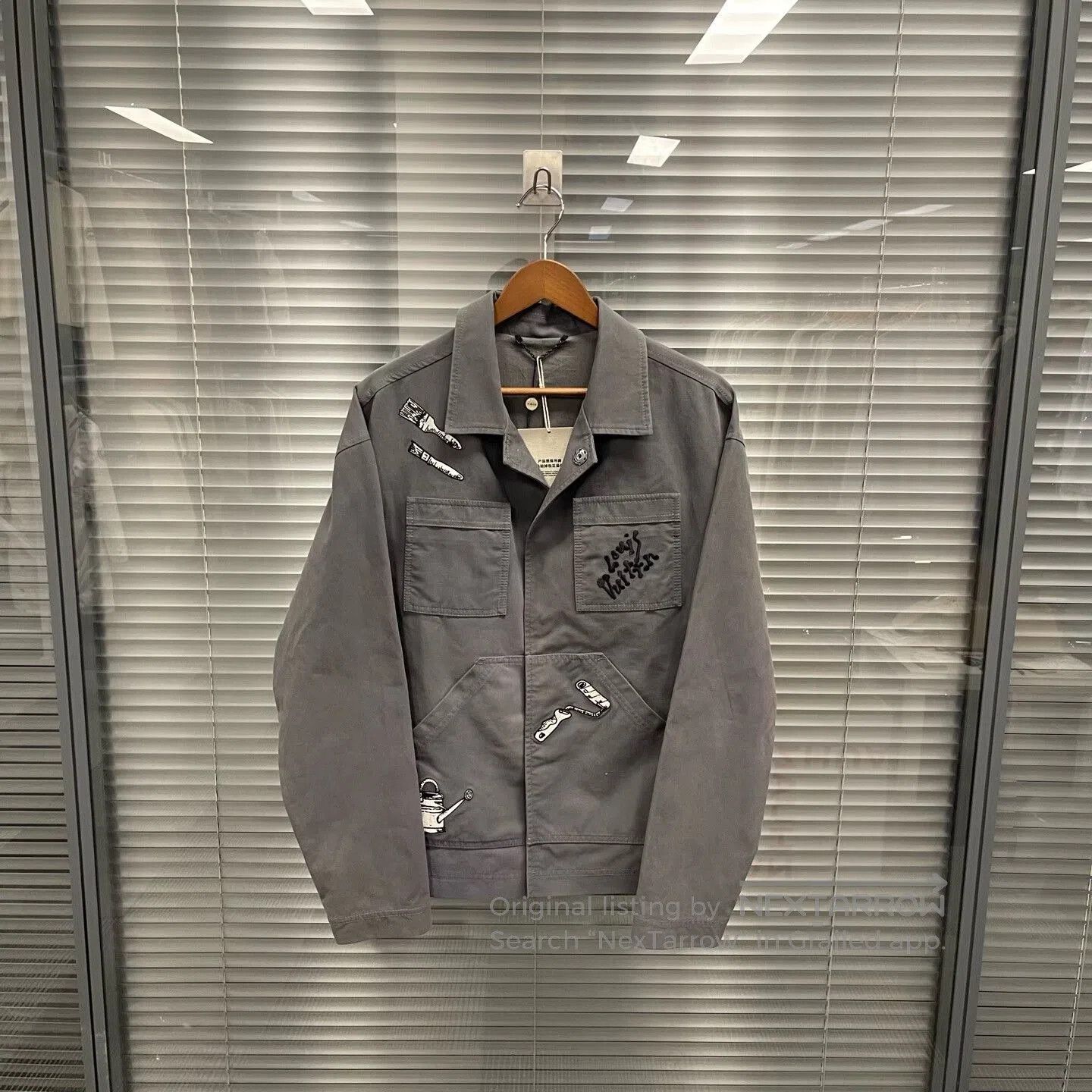 gray embroidered work jacket by louis vuitton.