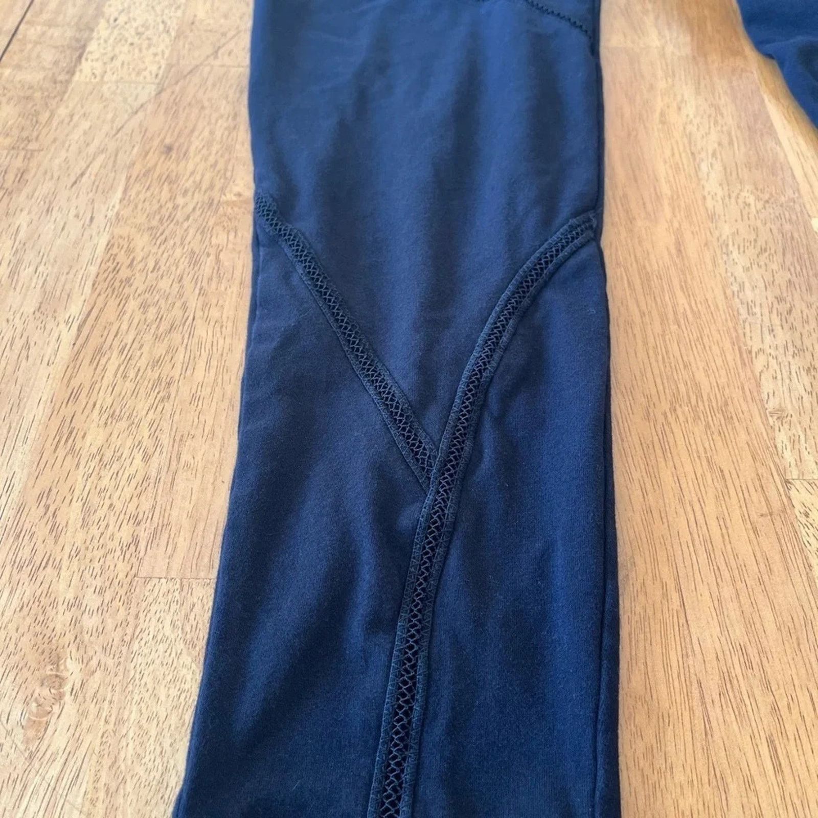 The Unbranded Brand Torrid leggings with cutouts down the legs, size 1 (XL) Size 40" / US 18 - 2 Thumbnail