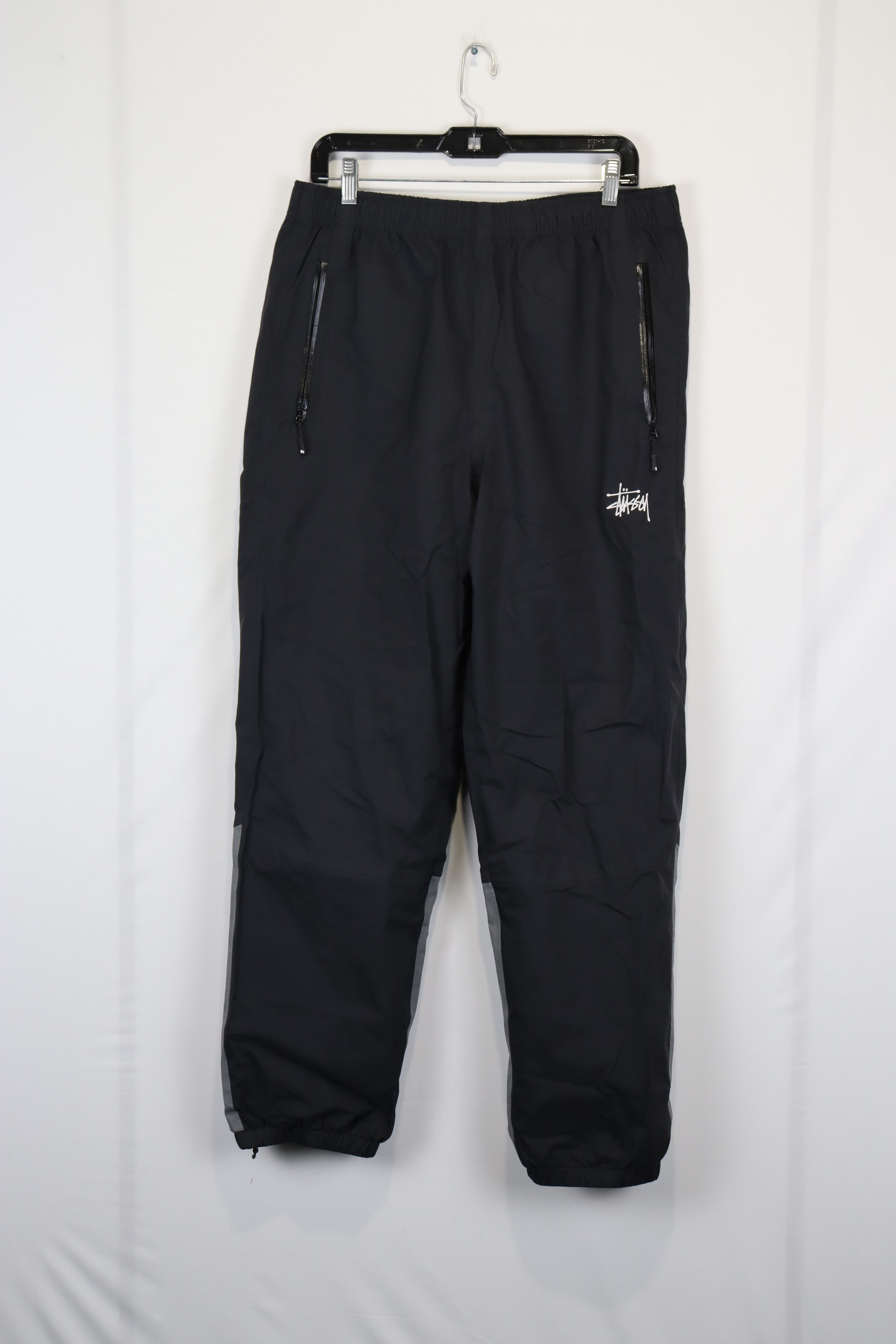 image of Stussy O1Rshd Logo Zipper Jogger / Sweatpants In Black, Men's (Size 32)