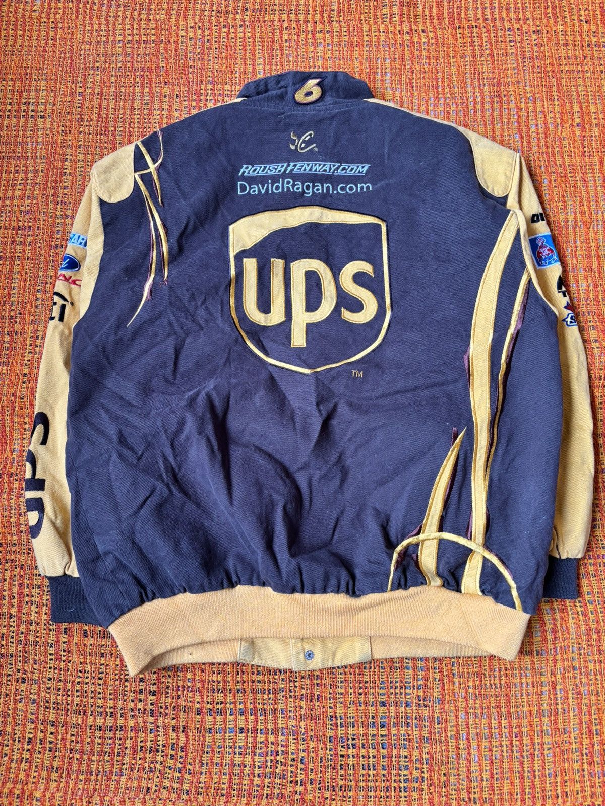Chase Authentics NASCAR UPS Racing Team brown & yellow jacket Size US L / EU 52-54 / 3 - 5 Thumbnail