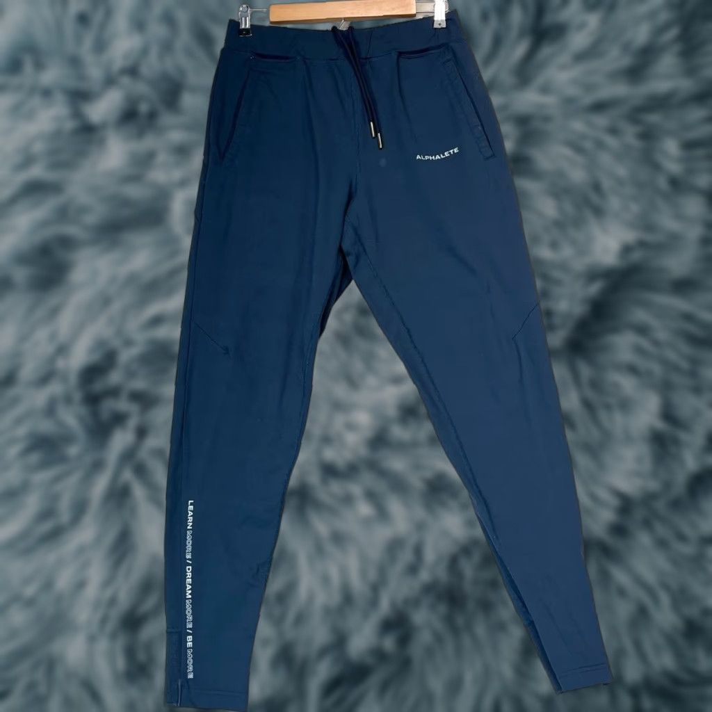 Vintage Alphalete Pants Mens Medium Blue Tech Joggers Performance Work Out Slash Pocket Tapered Regular Knit Polyester Exam: No extra text, just title. Size US 31 - 1 Thumbnail