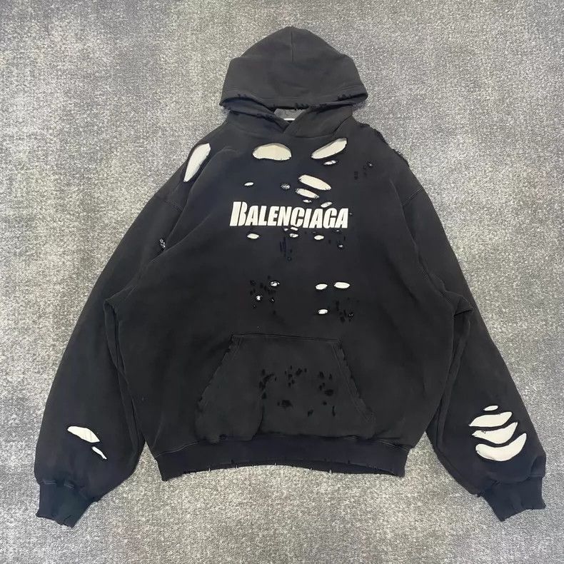 Balenciaga Balenciaga ripped logo hoodie -DMC | Grailed