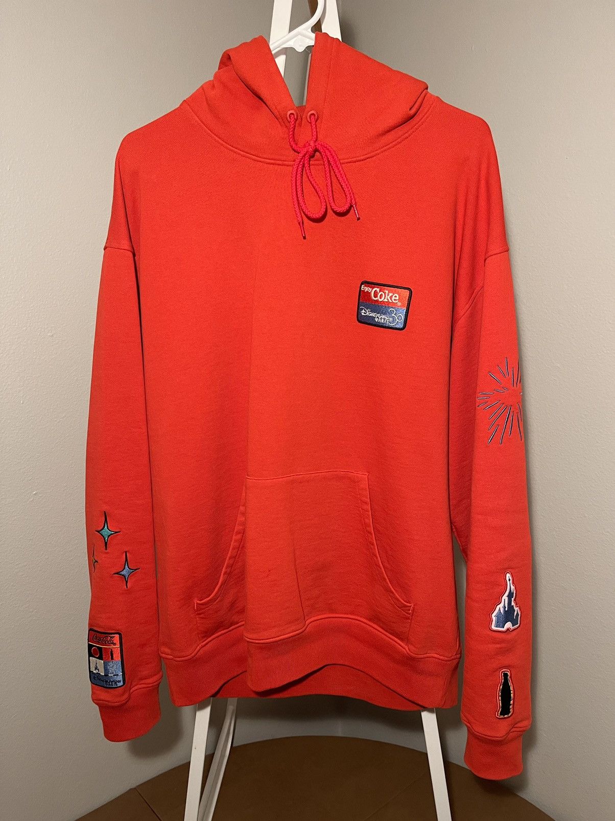 Image of Coca Cola x Disney Coca-Cola X Disneyland Paris 30 Year Anniversary Hoodie in Red, Men's (Size XL)