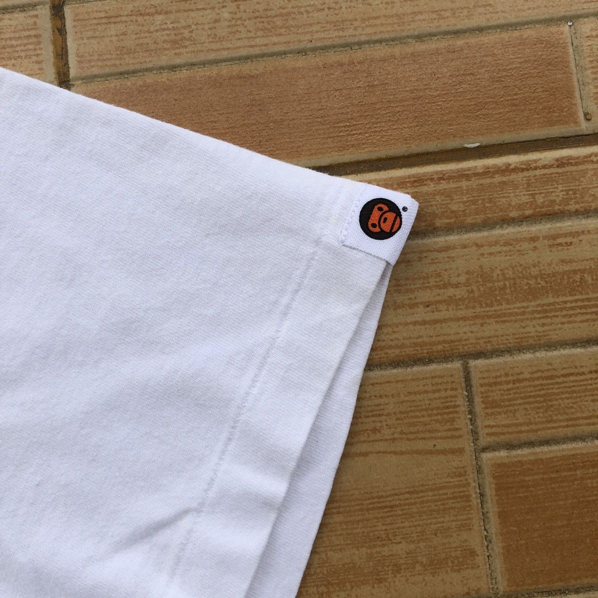 Bape × Kaws Bape x Kaws Baby Milo Tee Size US M / EU 48-50 / 2 - 7 Thumbnail