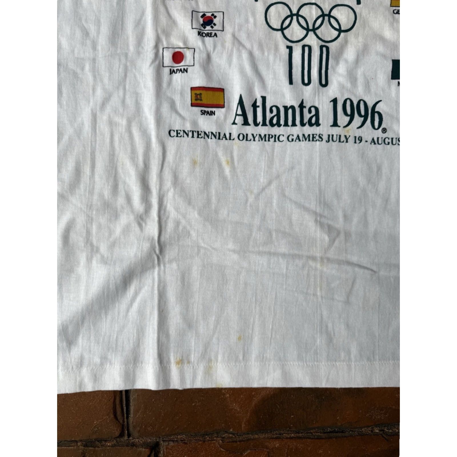 Hanes VINTAGE 1996 Atlanta Olympics T-Shirt 2XL Hanes White Crew Neck Short Sleeve Graphic Print Mens USA Olympics Size US XXL / EU 58 / 5 - 7 Thumbnail