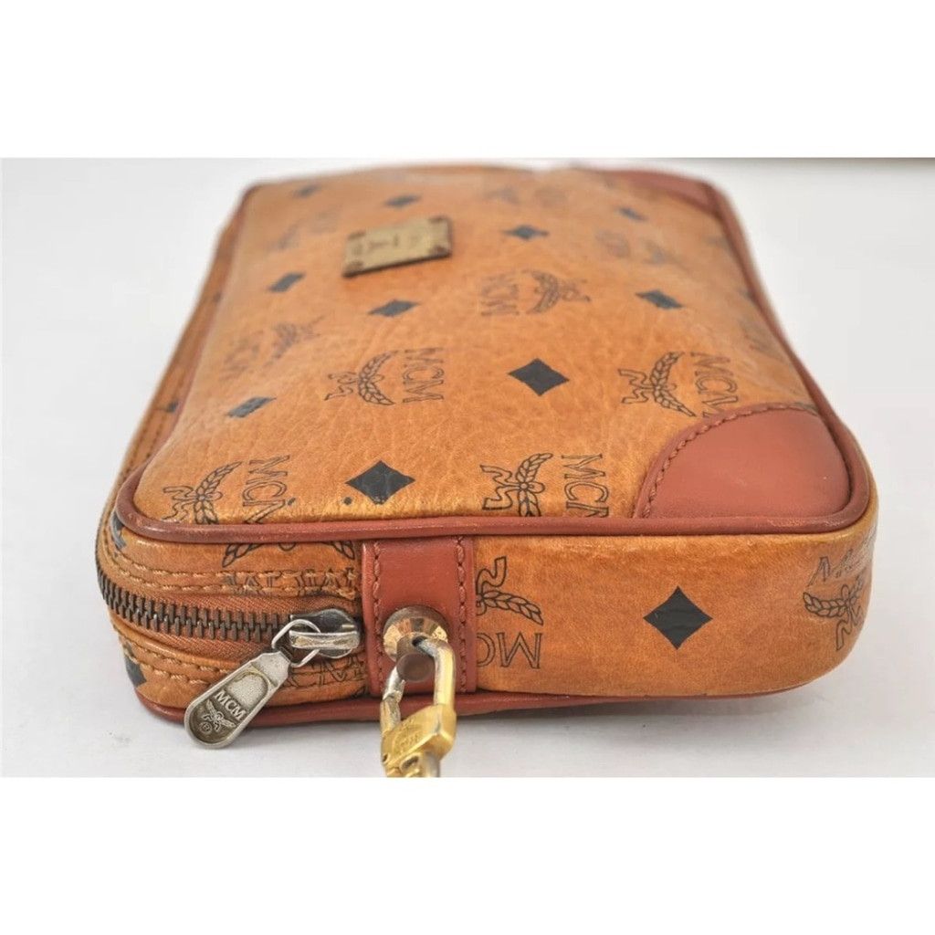 MCM MCM Brown Clutch with Logo Pattern and Wrist Strap Size ONE SIZE - 5 Thumbnail