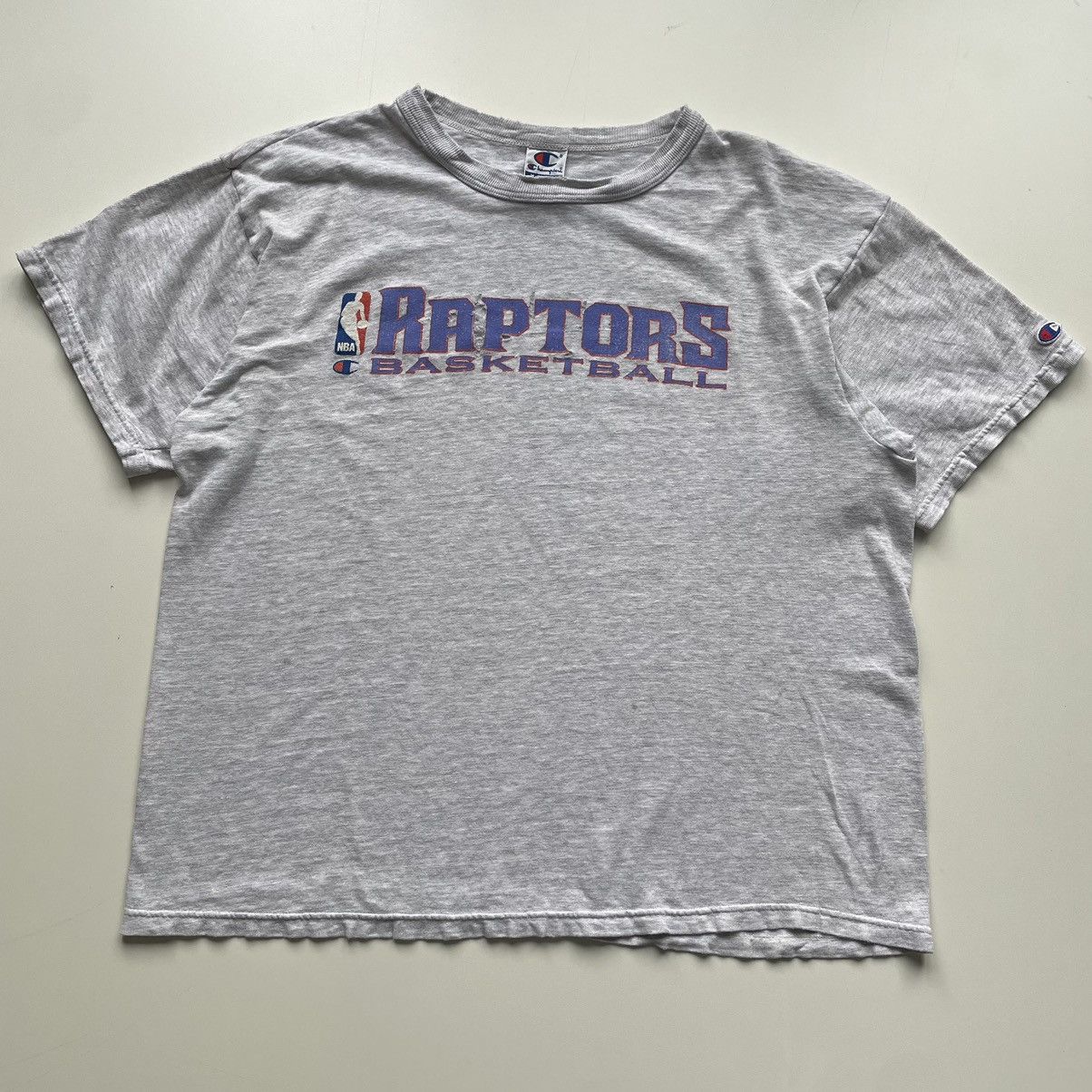 image of Champion x NBA Vintage 90's Toronto Raptors Basketball Graphic T Shirt in Grey, Men's (Size Large)