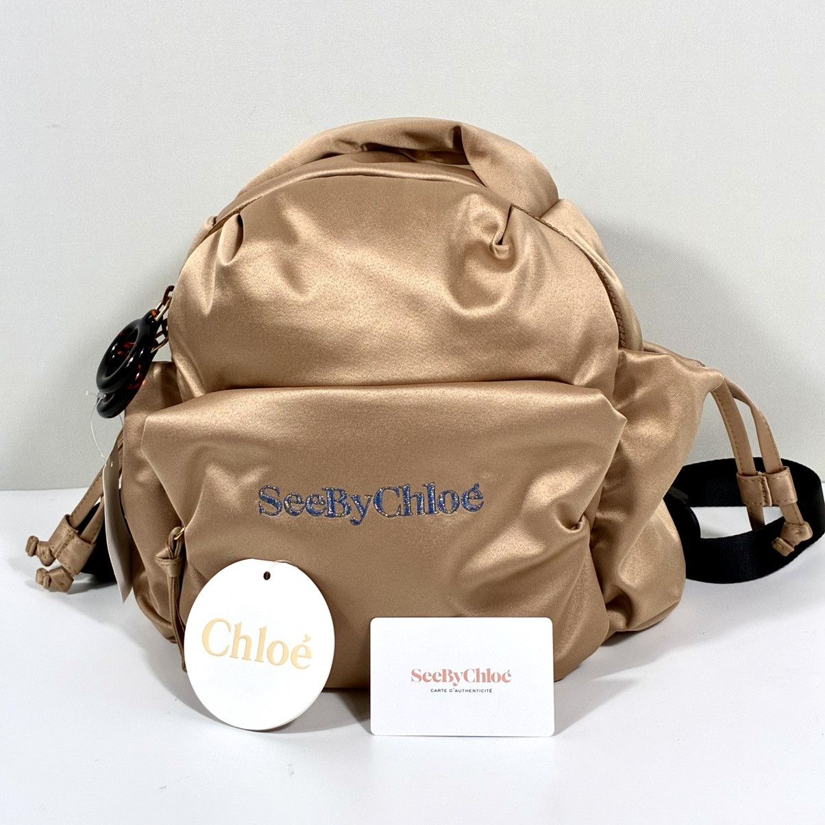 See by Chloe See by Chloe Tilly Satin Mini Backpack Biscotti Beige NWT Size ONE SIZE - 1 Thumbnail