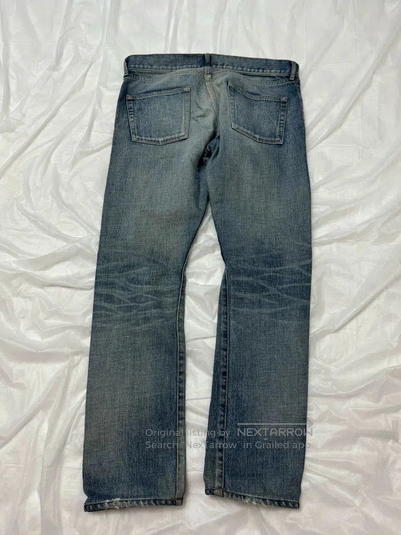 YSL Slim Ripped Denim Jeans.