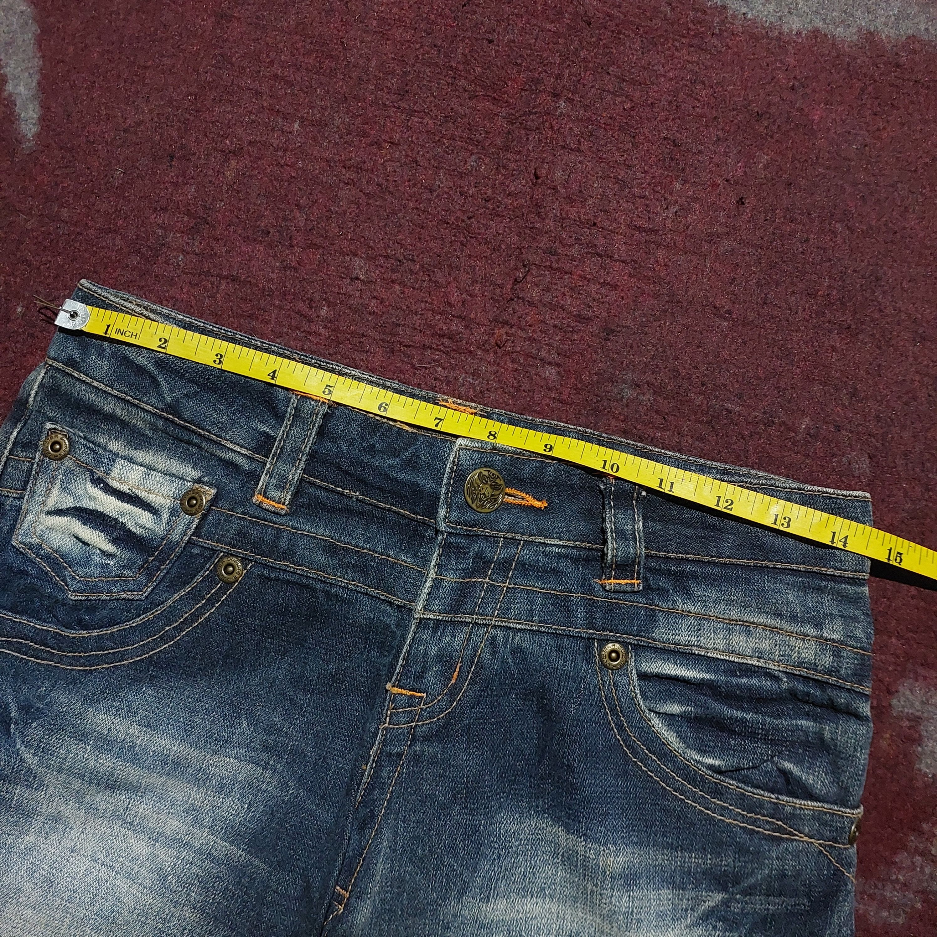 Tornado Mart The Comfortable Wear distressed blue flared jeans Size US 29 - 14 Thumbnail