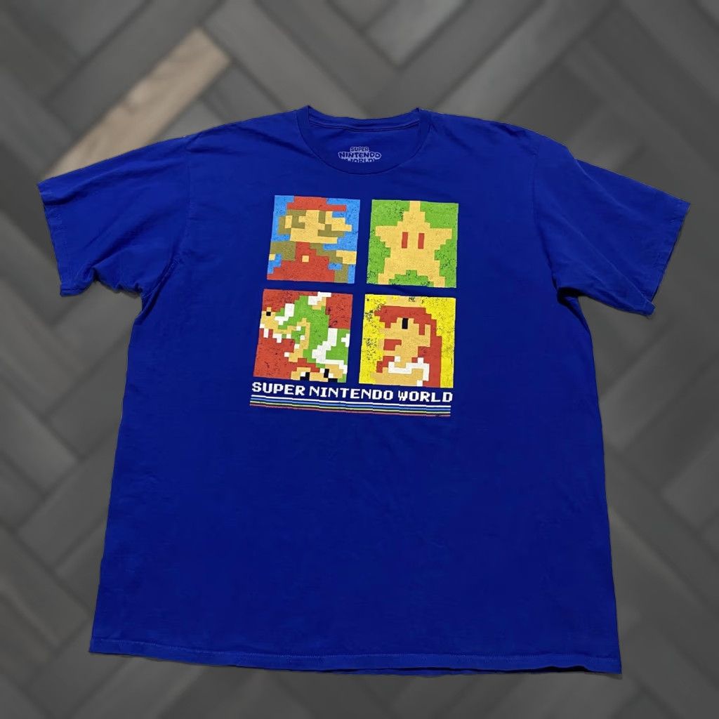 Nintendo VINTAGE Super Nintendo World Shirt Mens 2XL Blue Mario Bowser Peach Graphic Tee Size US XXL / EU 58 / 5 - 1 Thumbnail