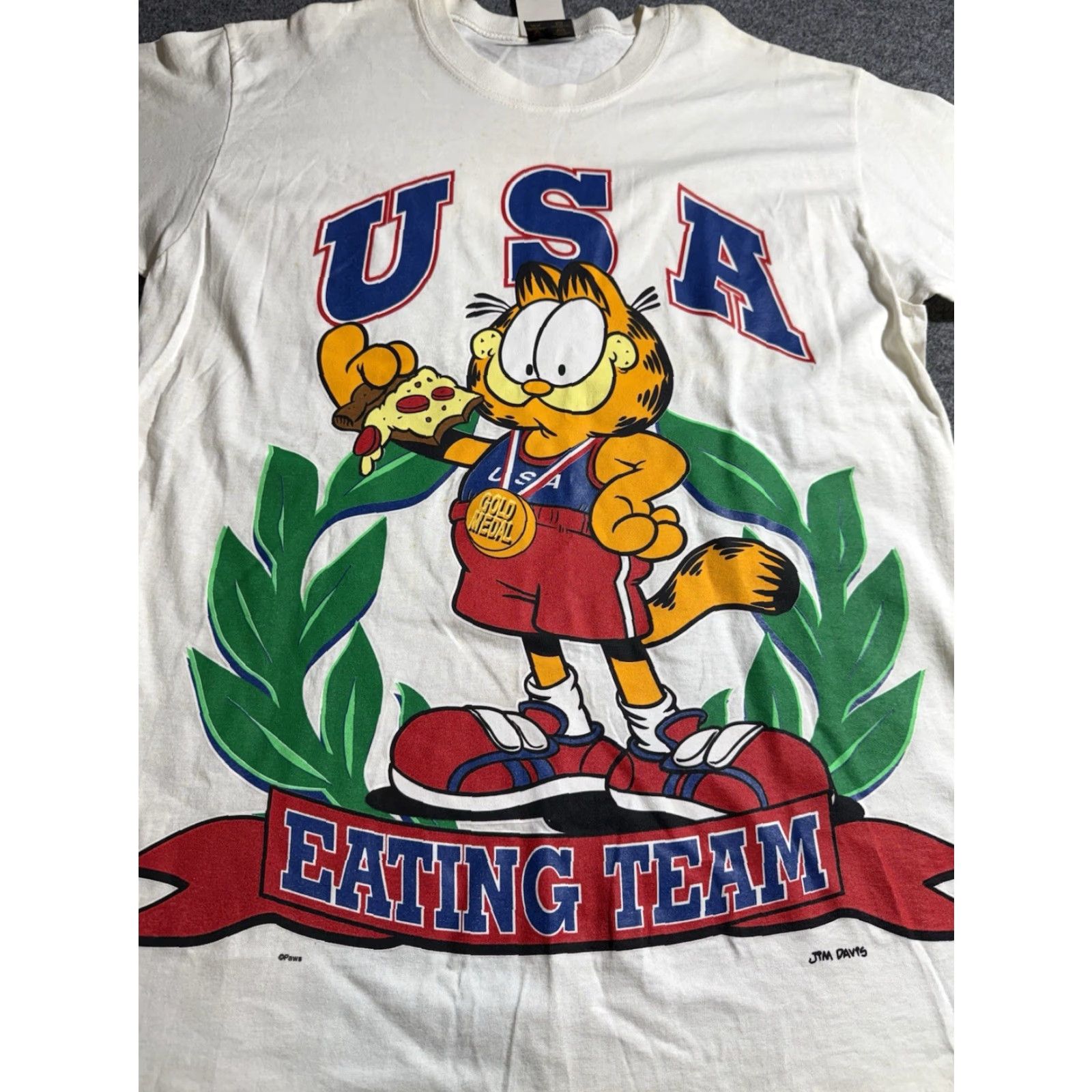 Vintage VINTAGE Garfield USA Eating Team Pizza Graphic Tee Shirt Mens Large NWT White Cotton Crew Neck Short Sleeve MEX Spring Ford USA Theme 90s Size US L / EU 52-54 / 3 - 5 Thumbnail