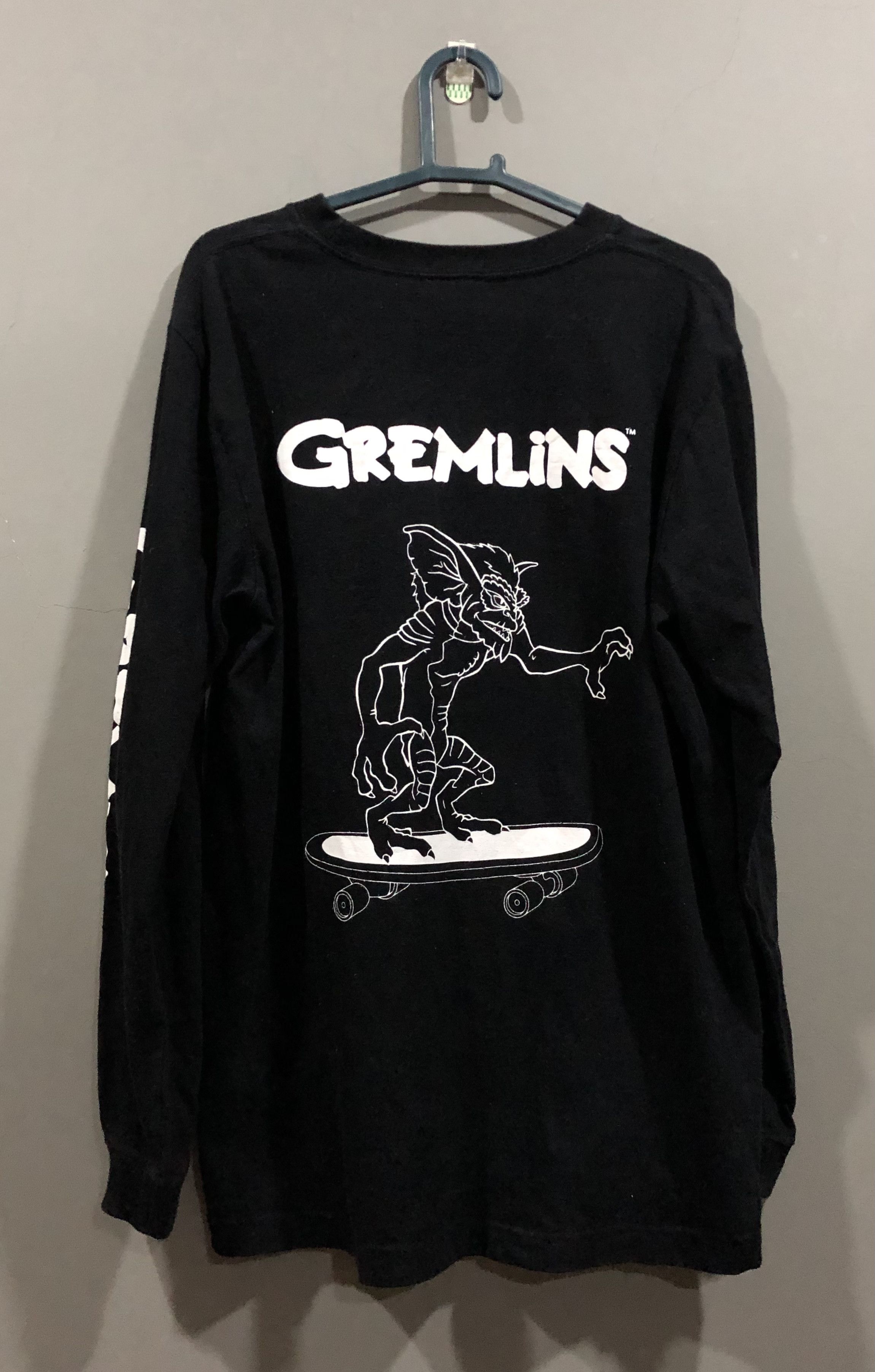 image of Cartoon Network x Movie Warner Bros Movie Gremlins Skateboard Longsleeve Tshirt in Black (Size Medi