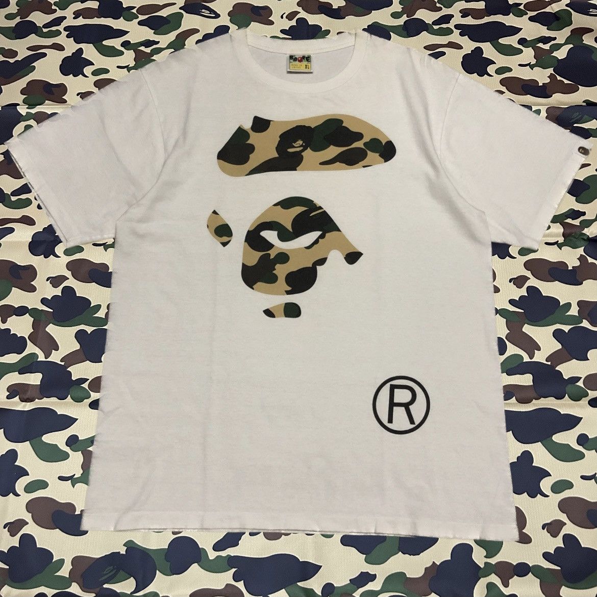 Bape 1st Camo Ape Face Tee Size US XL / EU 56 / 4 - 1 Thumbnail