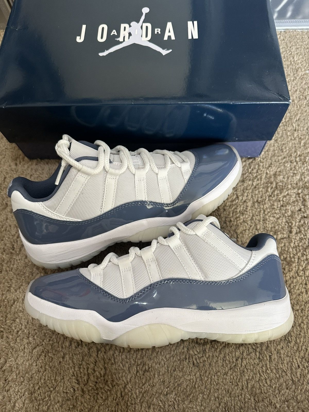Size 9.5 - Jordan 11 Retro Low Diffused Blue (FV5104-104)