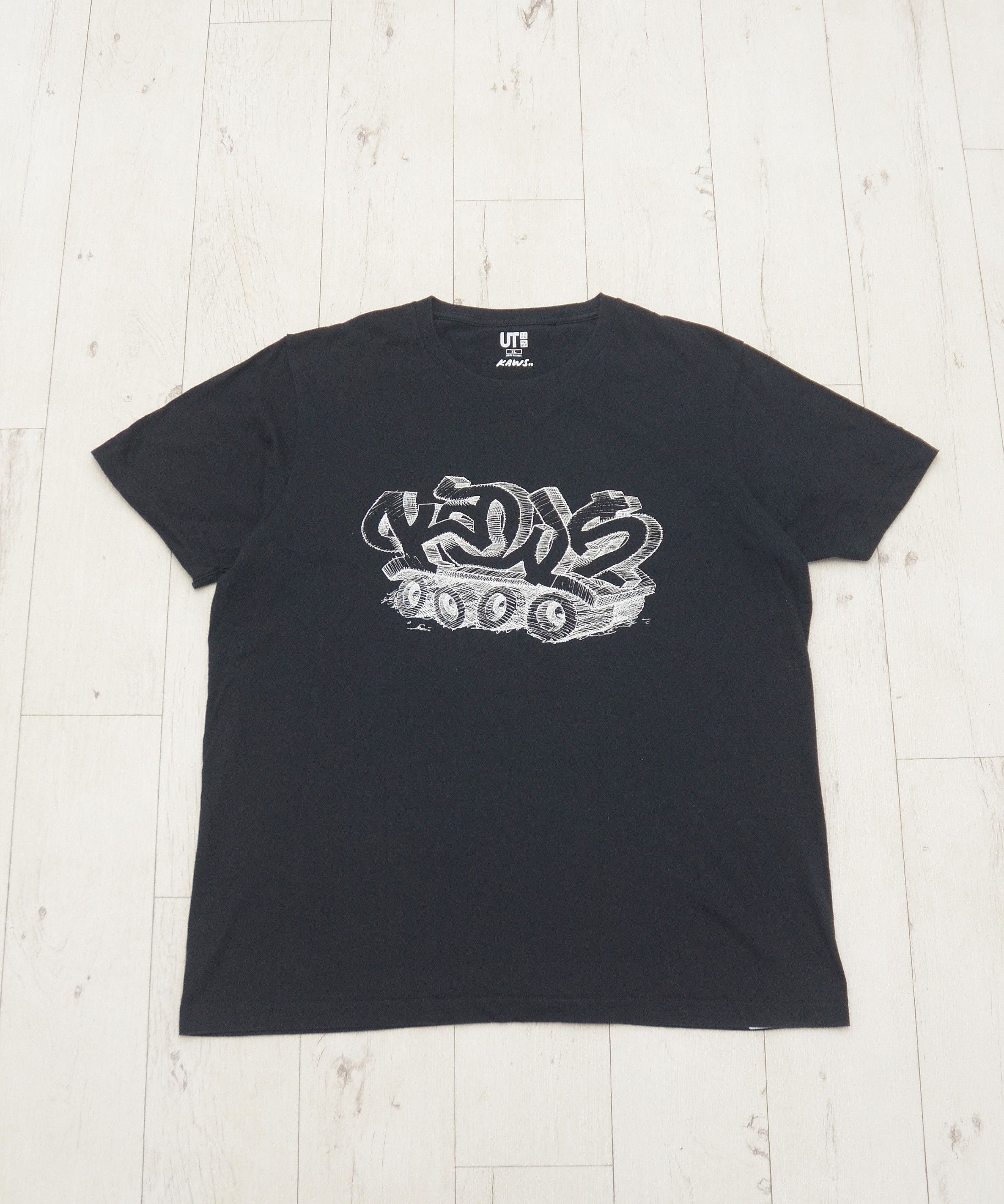 Kaws × Uniqlo Kaws x Uniqlo UT Graffiti Tank Black T-Shirt L size Size US XL / EU 56 / 4 - 1 Thumbnail