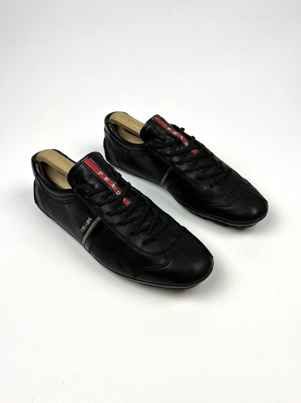 image of Italian Designers Prada Red Tab Low-Top Leather Sneakers in Black, Men's (Size 10)