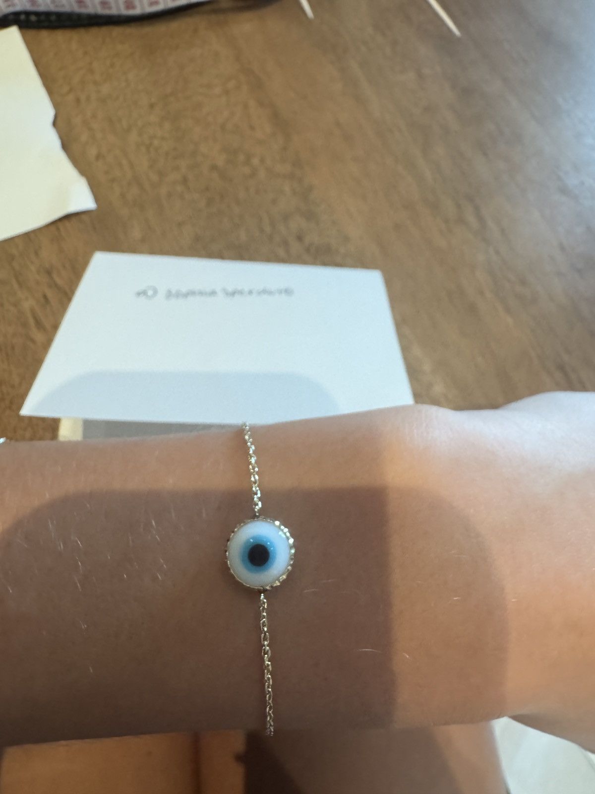 14k gold white evil eye bracelet