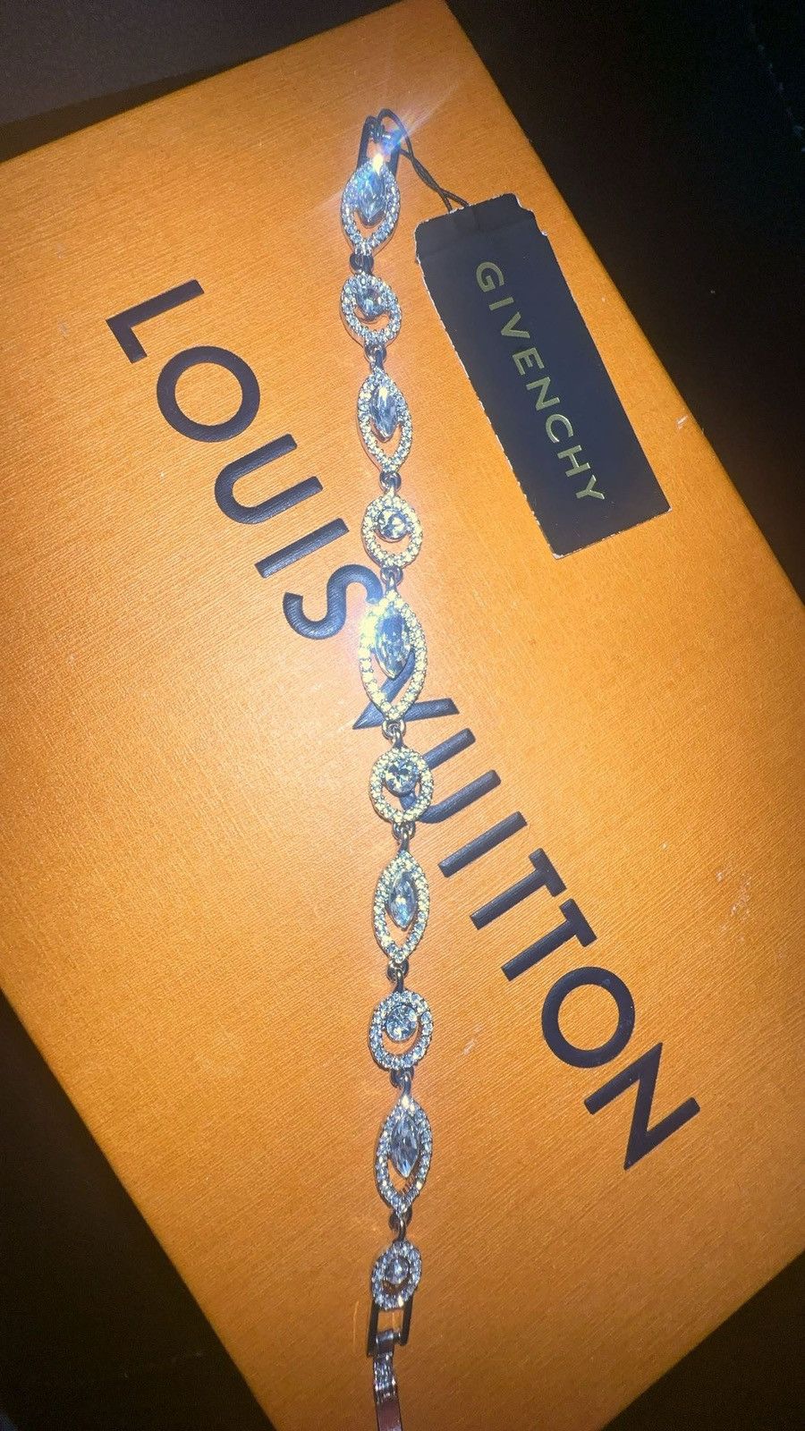 Givenchy RARE Givenchy Pave crystal orb flex bracelet | Grailed