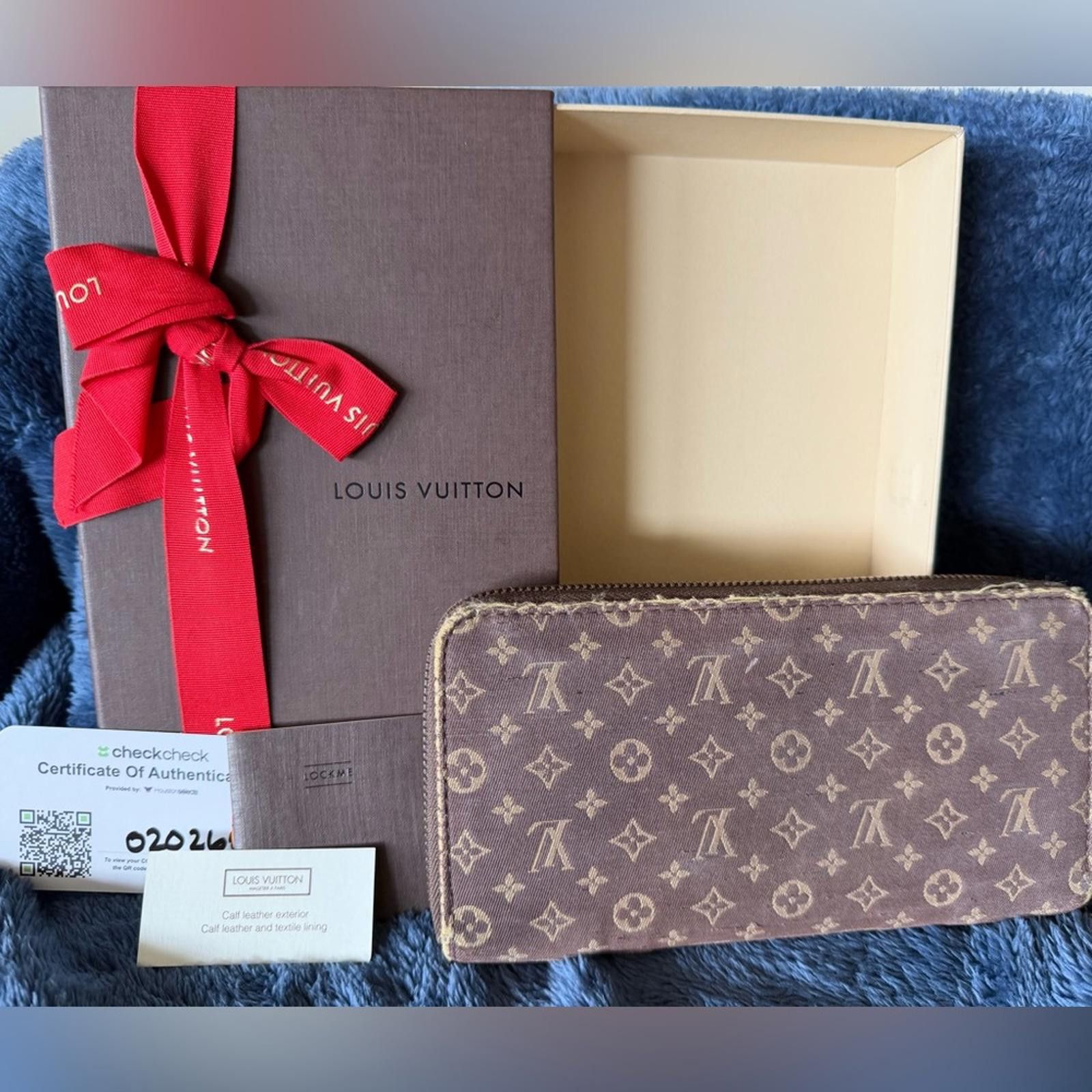 Louis Vuitton Louis Vuitton Monogram Denim Zippy Wallet in Brown and Tan Size ONE SIZE - 1 Thumbnail