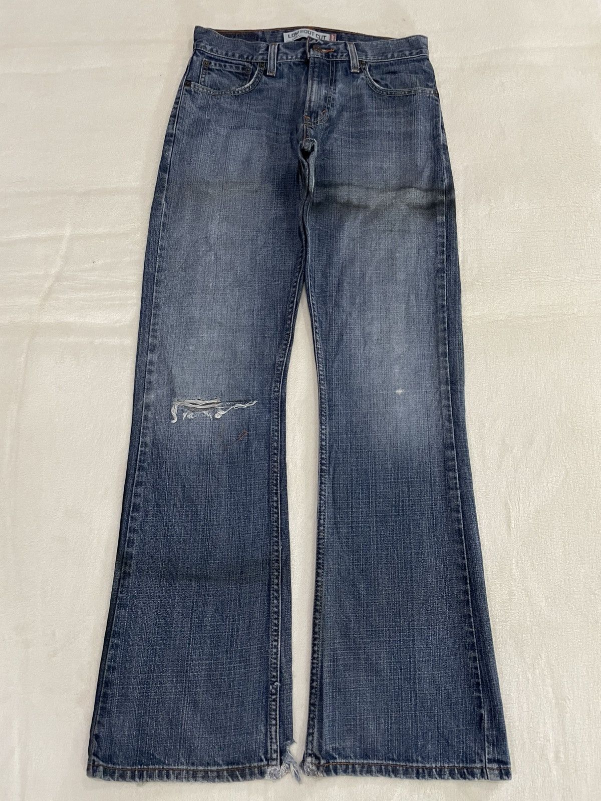 Vintage Levi’s Low Boot Cut Distressed Denim Jeans