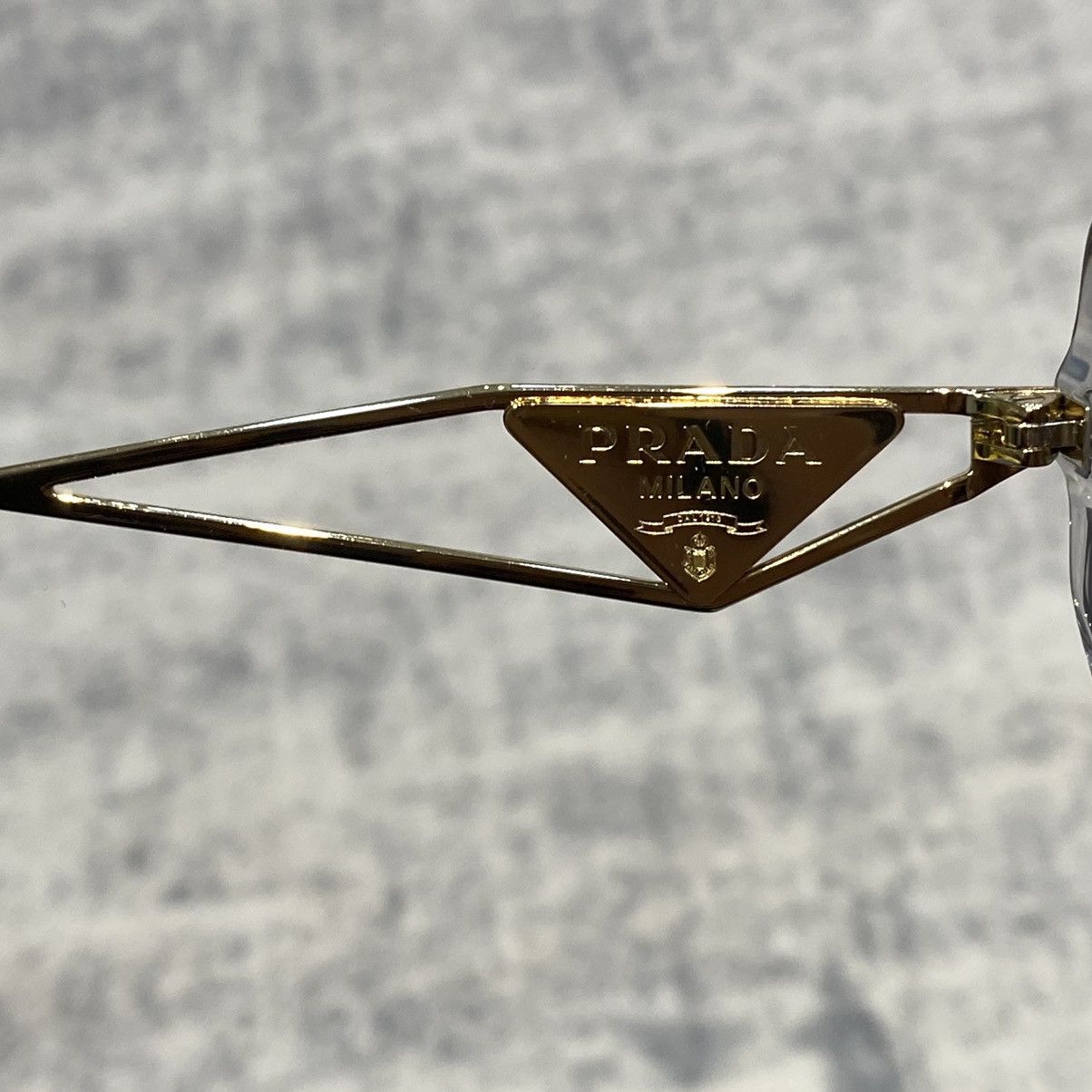 PRADA 0PR 14YS 12R50K TRANSPARENT GREY