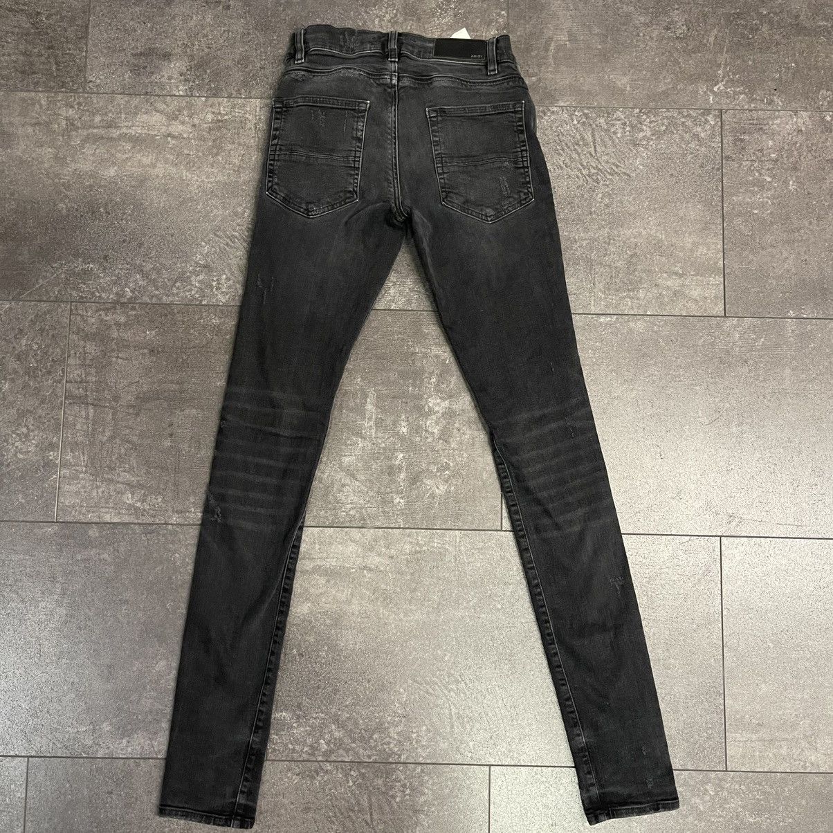 Amiri Distressed Patched Jeans Black