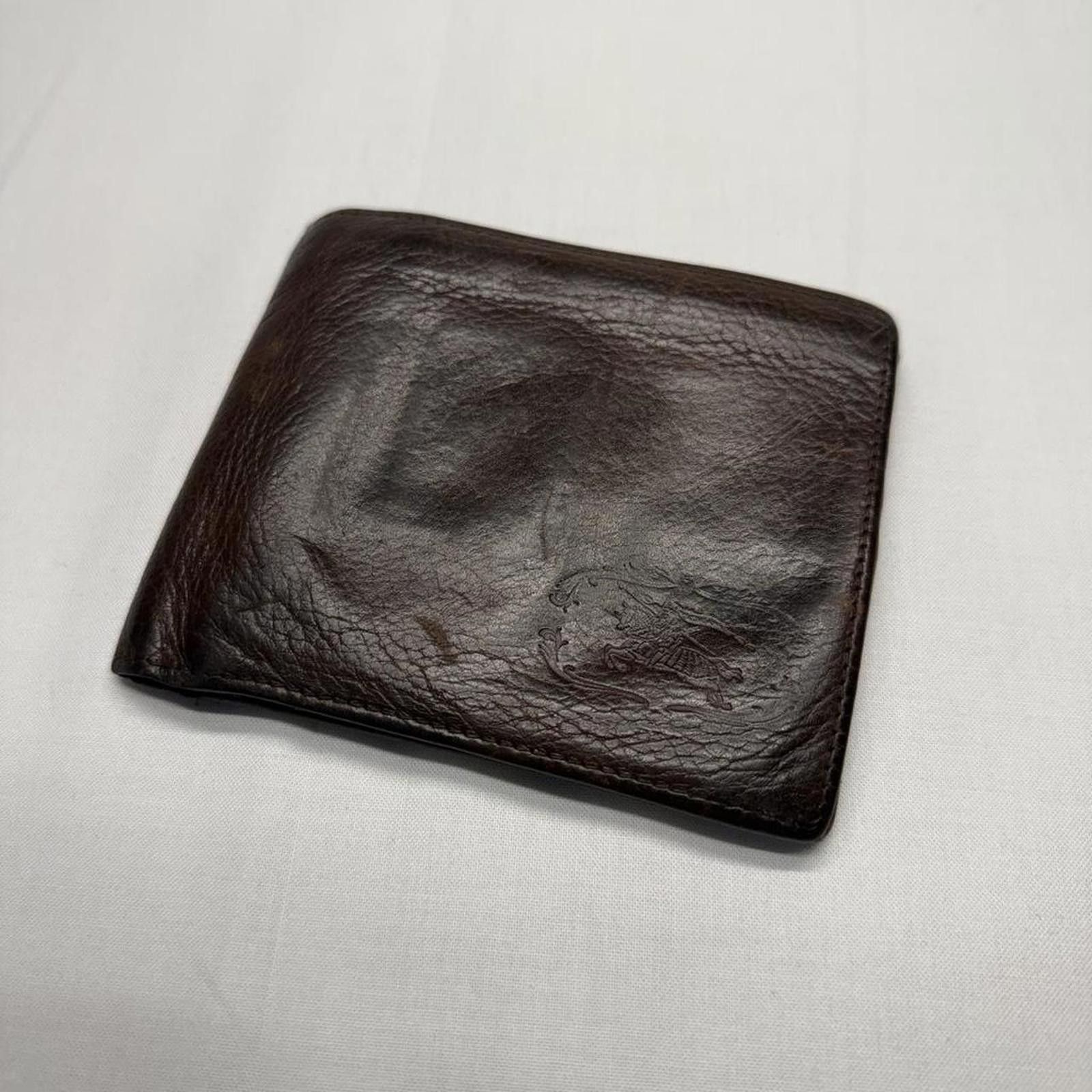 Authentic Burberry leather wallet with embossed logo