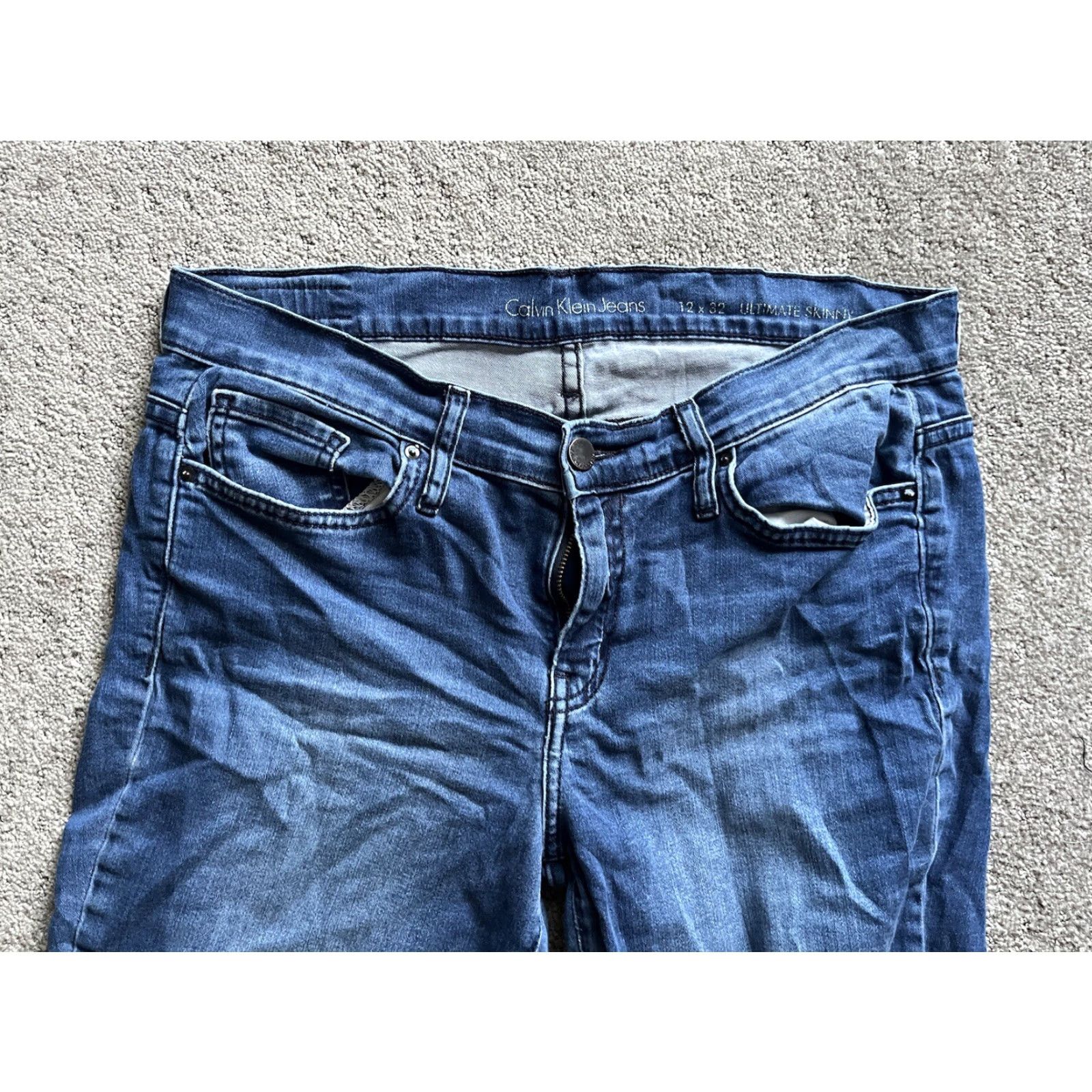Calvin Klein Calvin Klein Jeans Ultimate Skinny Distressed Denim 12 Women 24 Inseam Medium Blue 5-Pocket Leather Logo Zip Fly Regular Size 12 Womens Size 34" / US 12 / IT 48 - 4 Thumbnail