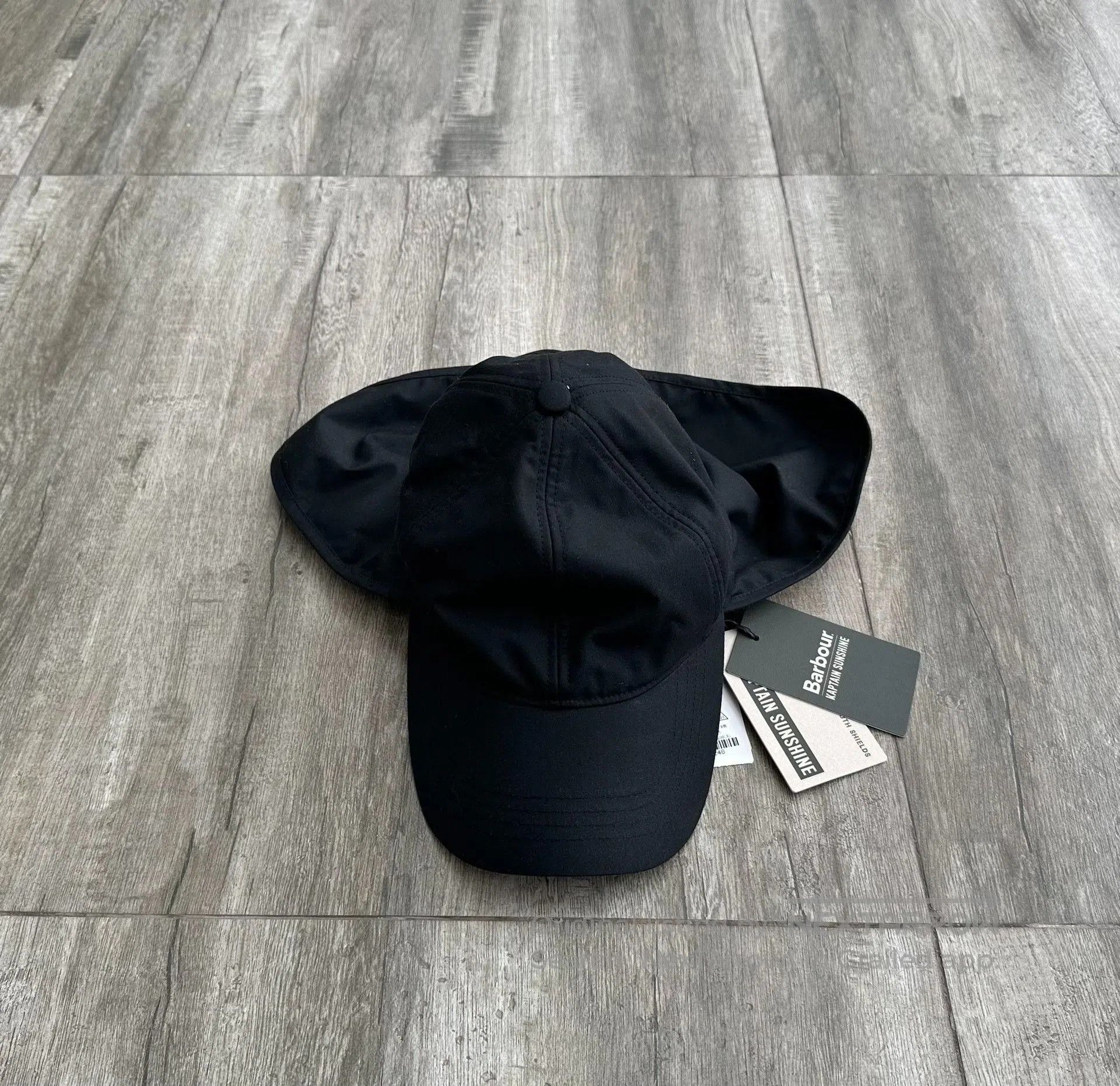 kaptain sunshine x barbour caped cap.