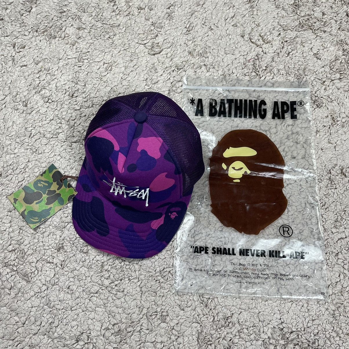 image of Bape x Stussy Trucker Cap in Purple, Men's