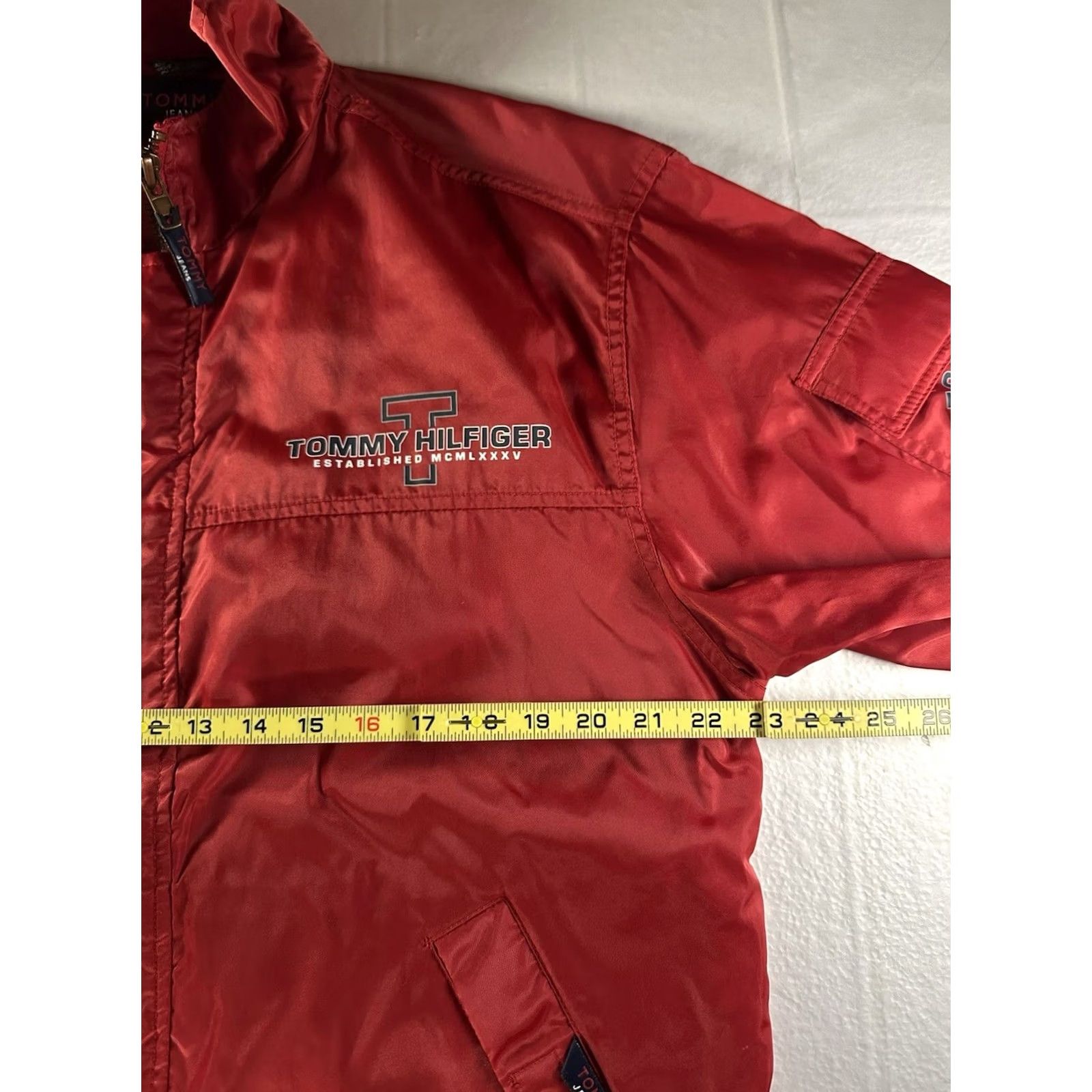 Tommy Hilfiger VTG Tommy Hilfiger Jeans Jacket Mens Medium Red Logo Windbreaker Hooded Nylon Front Zip Button Snap Sailor Windbreaker *Flaw" Size US 31 - 6 Thumbnail