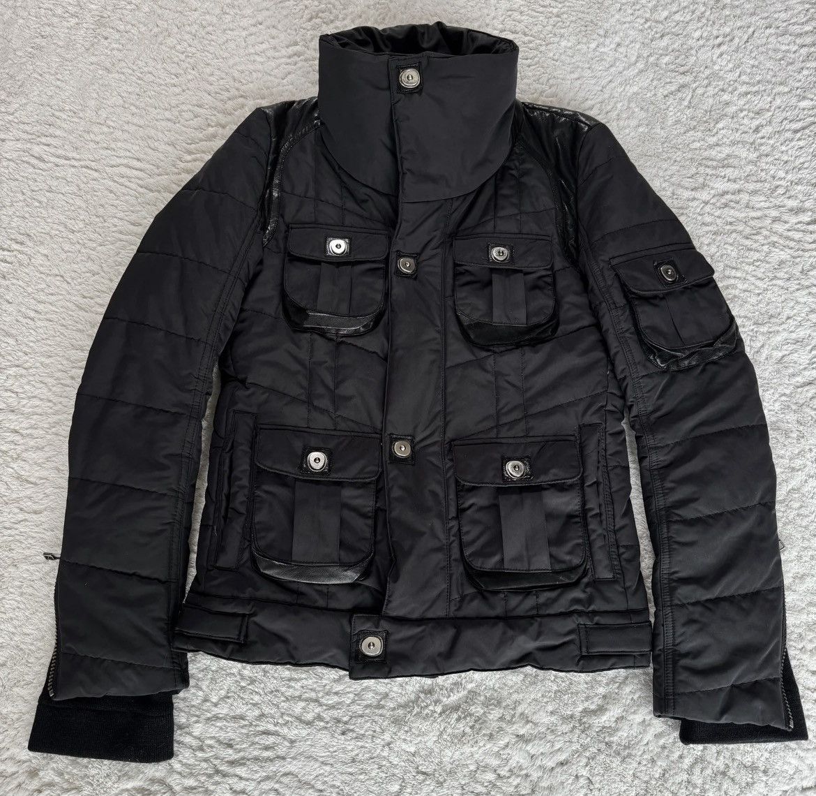 Yasuyuki Ishii. gas mask puffer jacket leather detailed